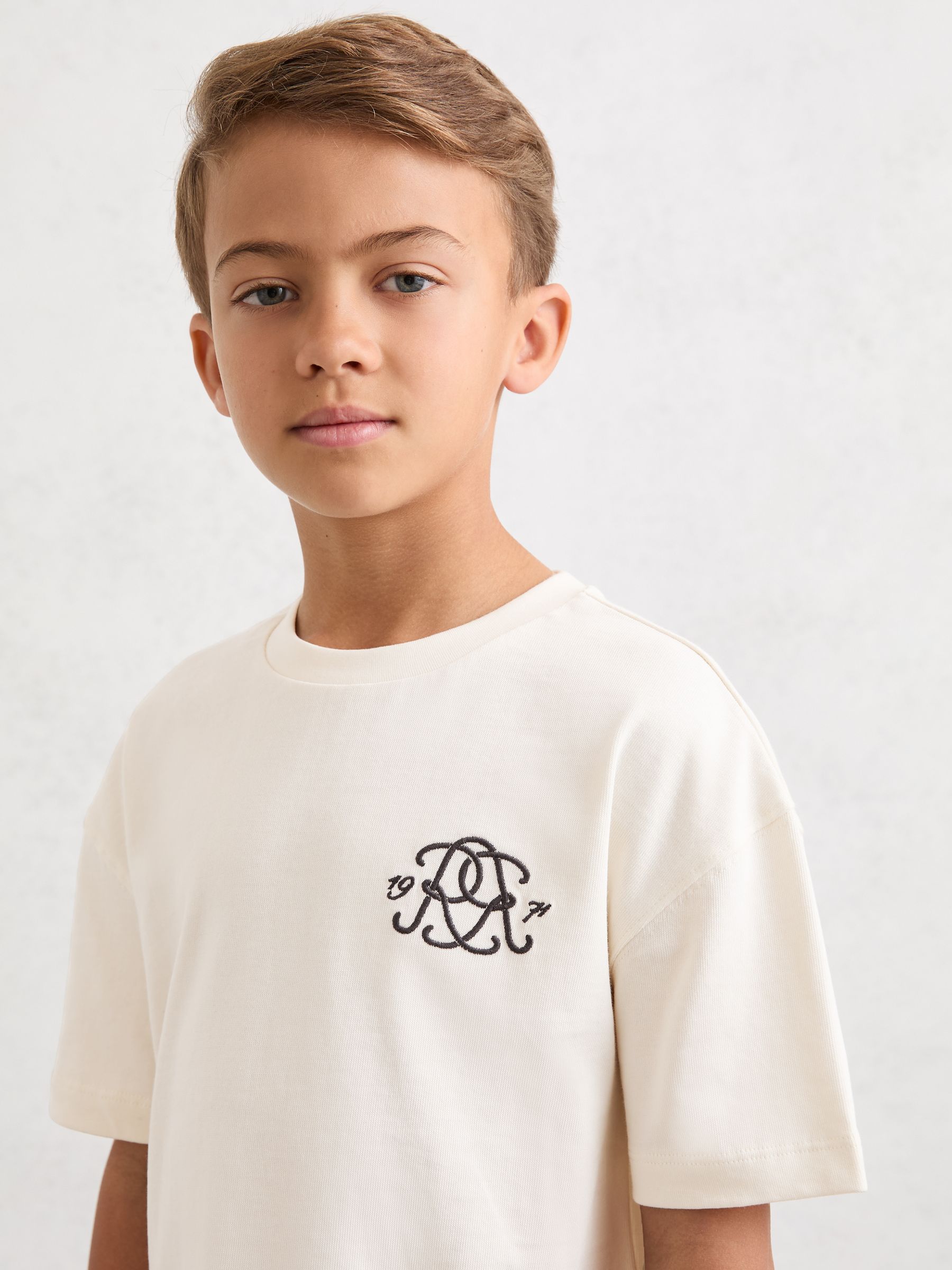 3-9 Jahre Monogram Baumwoll-T-Shirt mit Rundhals in Off White - Bild 1 von 6