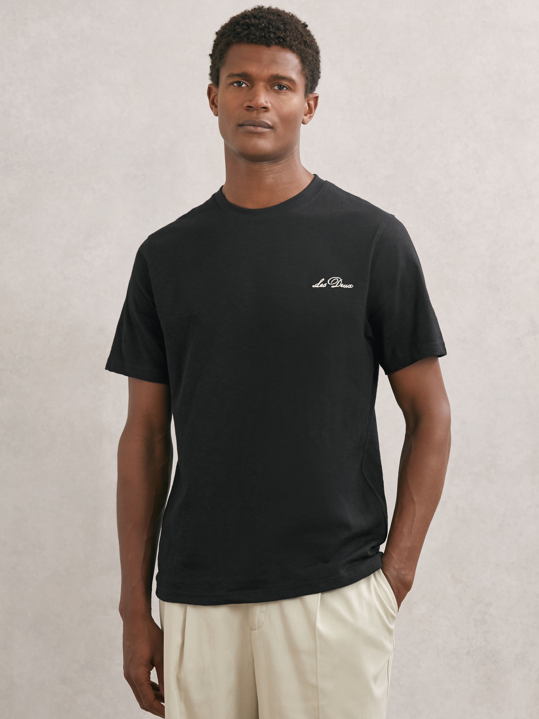 Les Deux Baumwoll-T-Shirt mit Grafik-Print in Schwarz - Bild 1 von 5