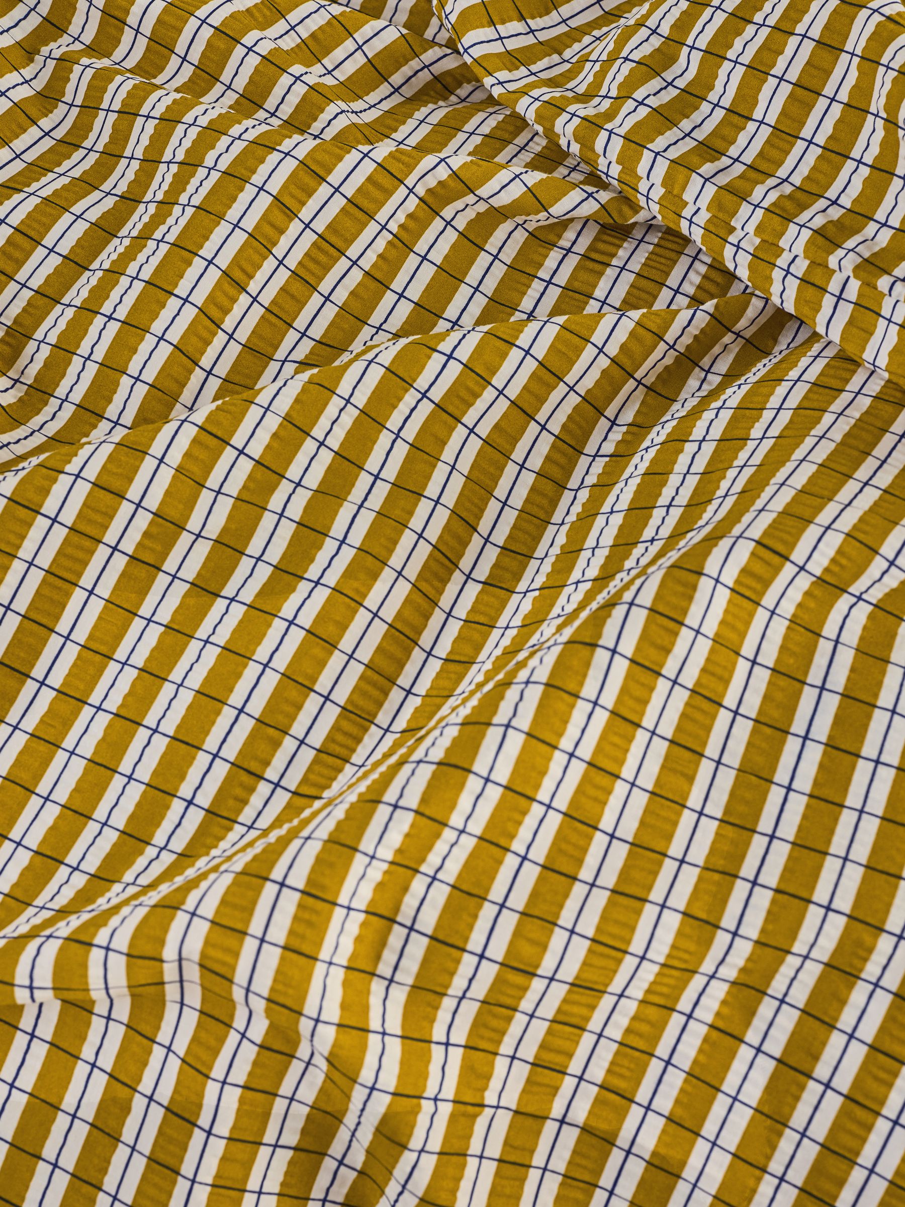 Felix Seersucker Duvet Cover and Pillowcase Set in Ochre - Image 3 of 4