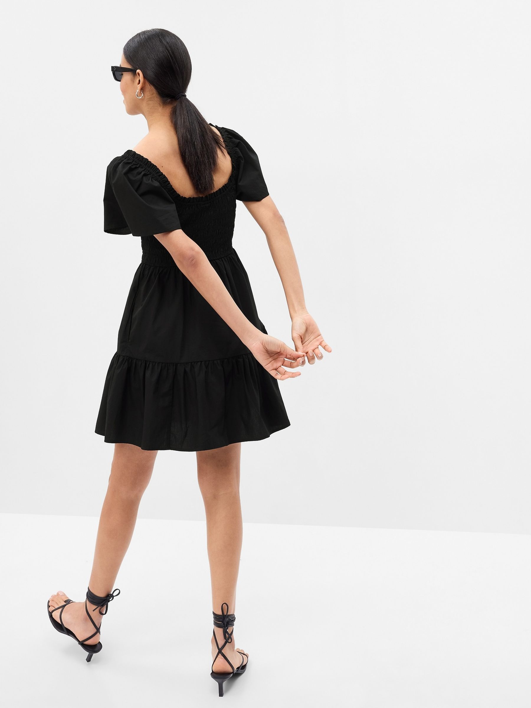 Black Flutter Sleeve Smocked Mini Dress - Image 2 of 4 Black Flutter Sleeve Smocked Mini Dress - Image 2 of 4