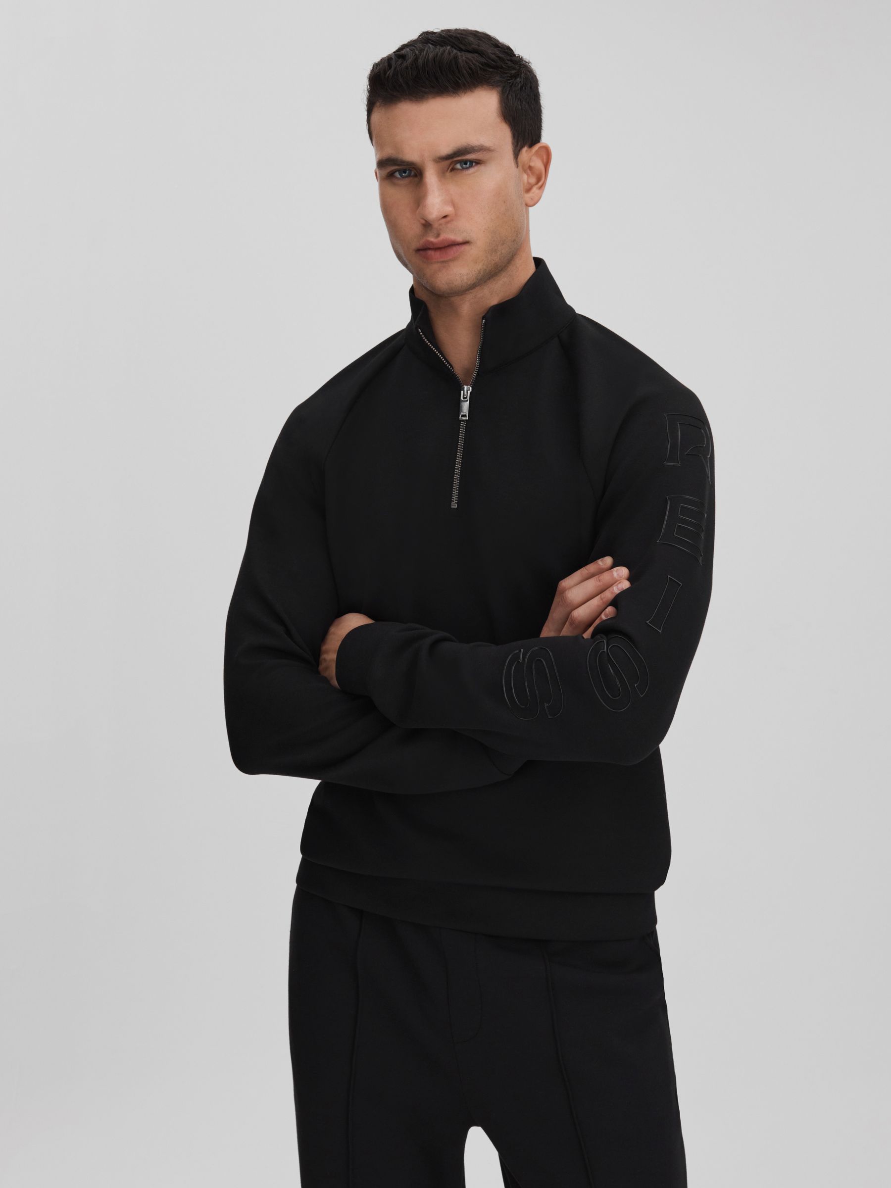 Interlock Jersey Half-Zip Funnel Neck Sweatshirt in Black - Image 1 of 7