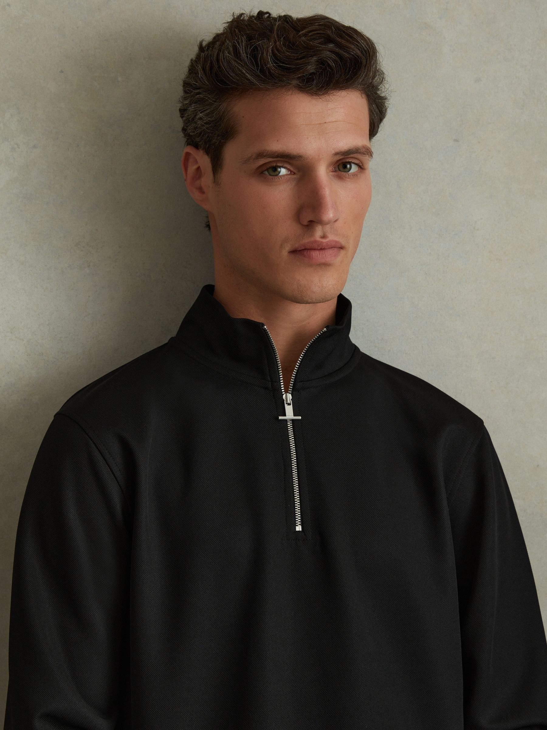 Textured Half-Zip Funnel Neck Jumper in Black - Image 1 of 4 Textured Half-Zip Funnel Neck Jumper in Black - Image 1 of 4