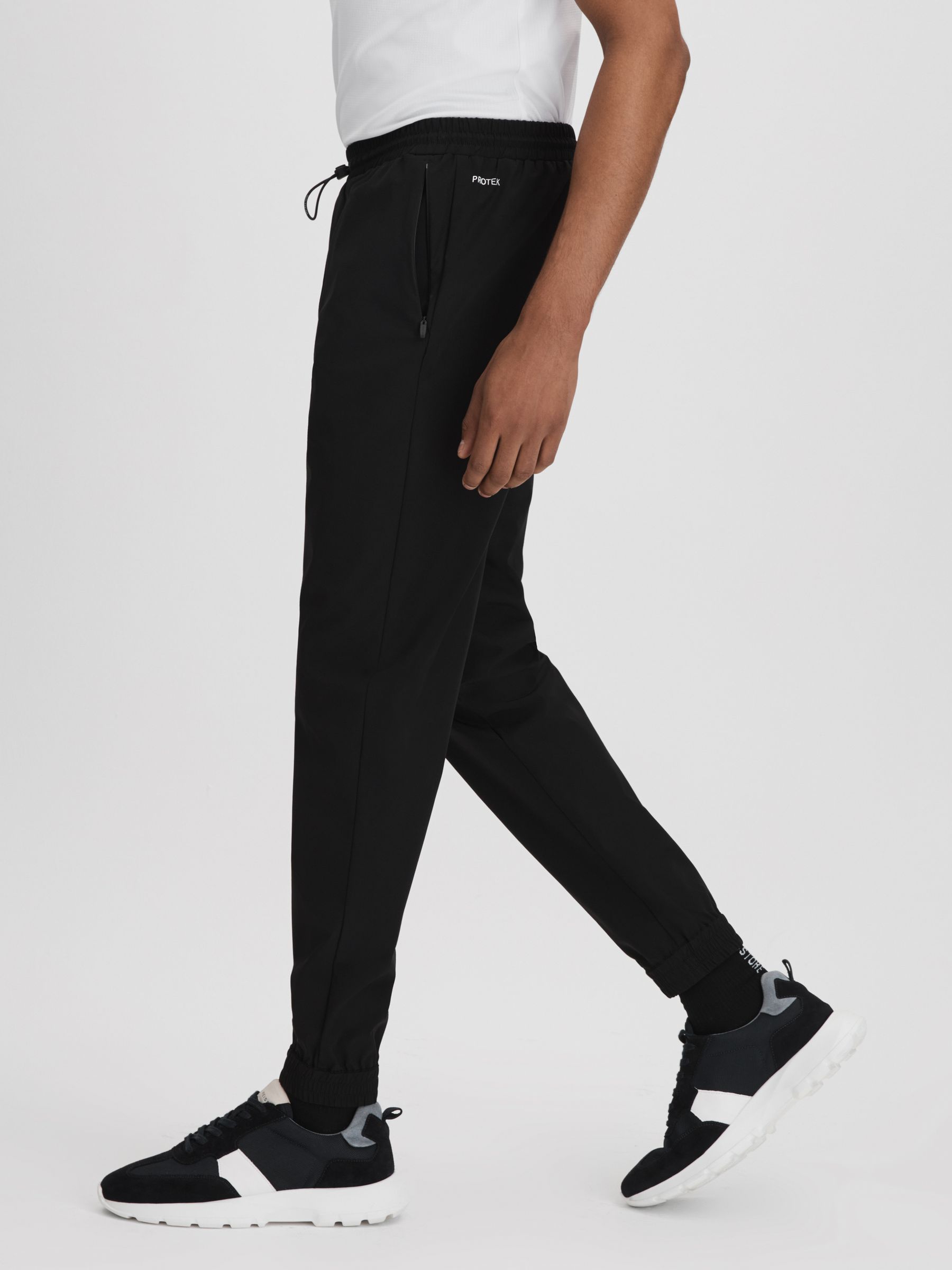 Castore Water Repellent Track Joggers in Onyx Black - Image 7 of 8