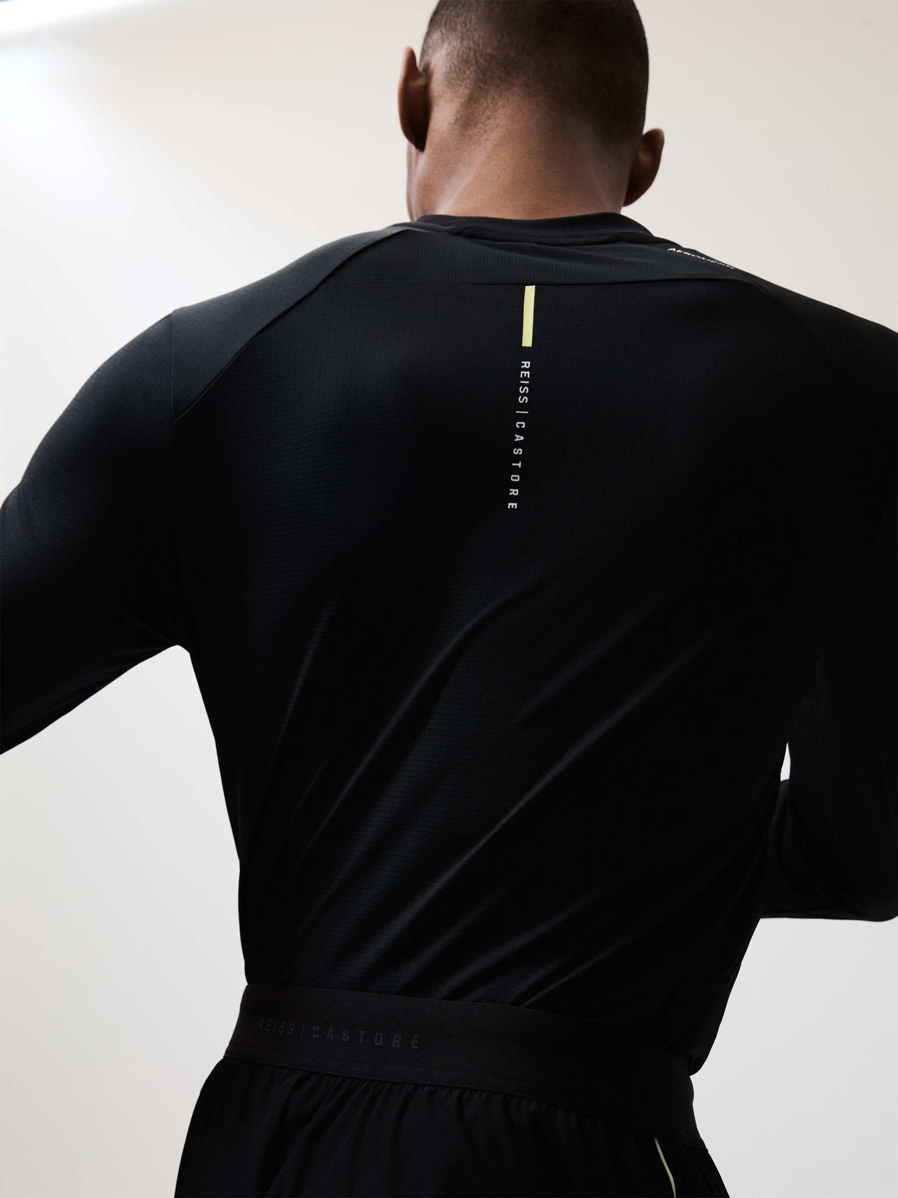 Castore Performance Long Sleeve Top in Onyx Black - Image 1 of 7
