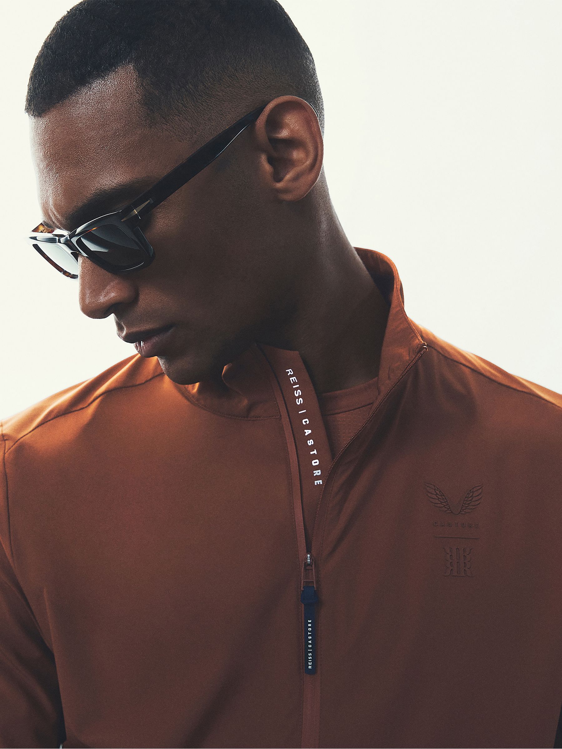 Castore Water Repellent Track Jacket in Rust - Image 1 of 8