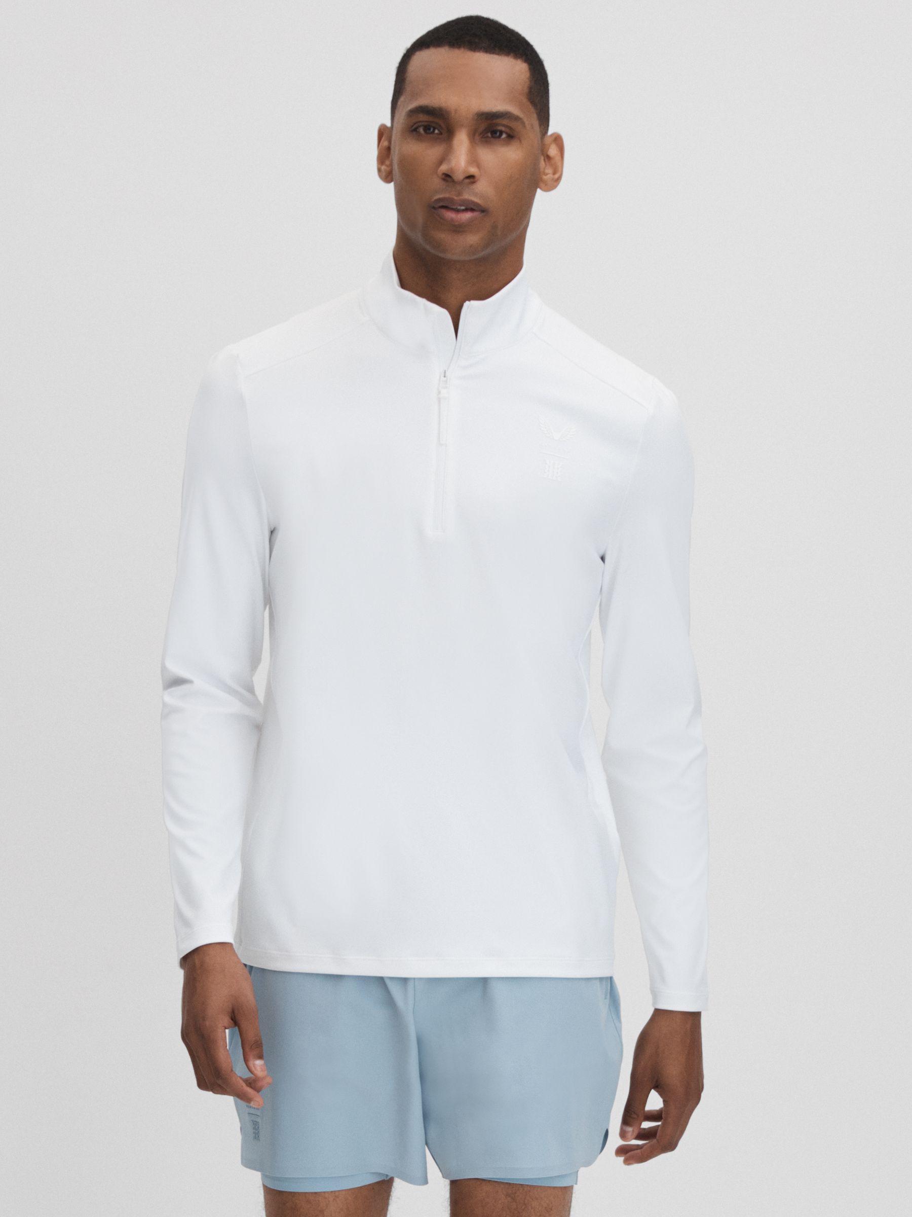 Castore Performance Quarter-Zip Funnel Neck Top in White - Image 1 of 7
