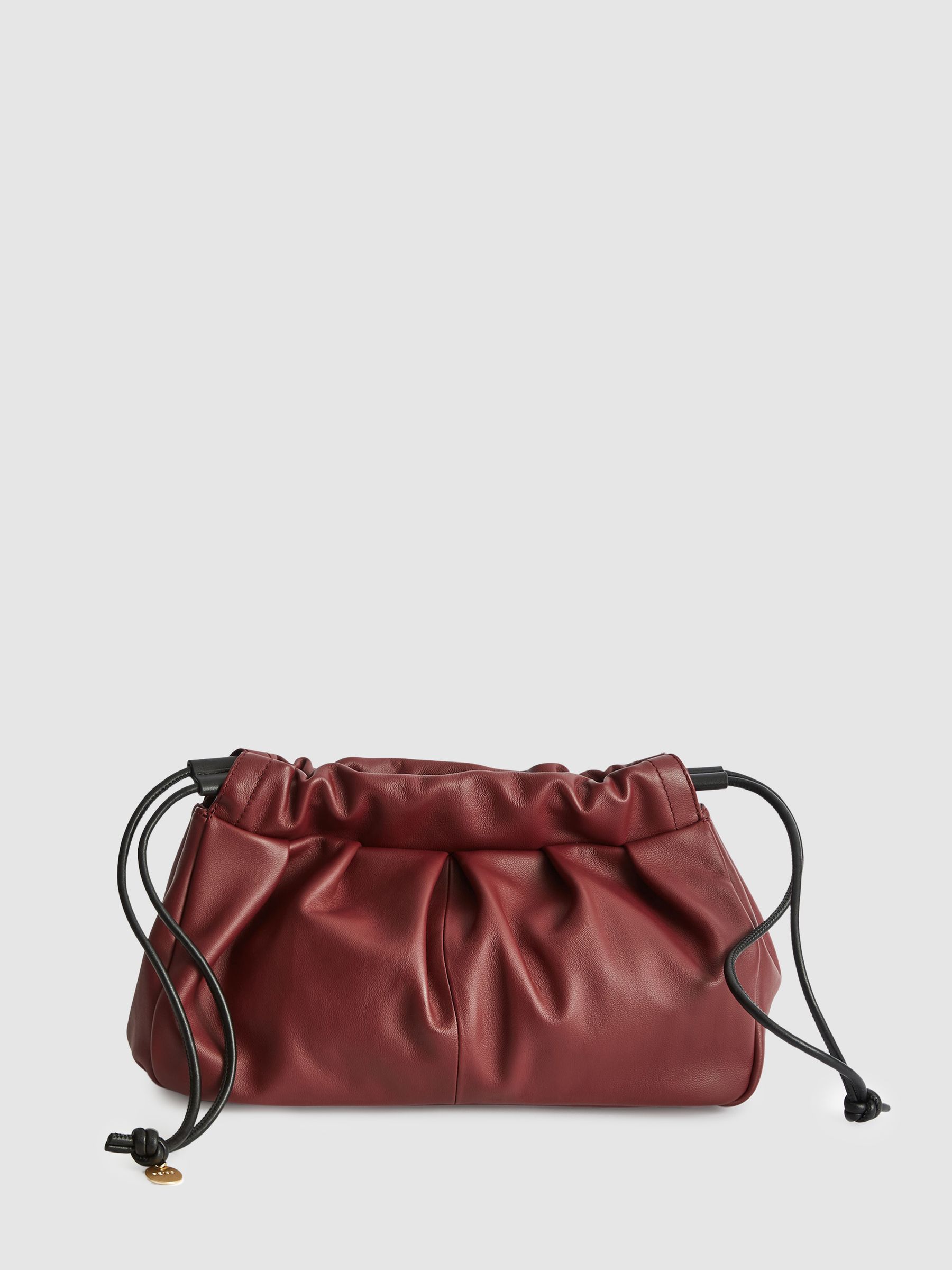 Leather Drawstring Clutch Bag in Bordeaux - Image 1 of 5 Leather Drawstring Clutch Bag in Bordeaux - Image 1 of 5