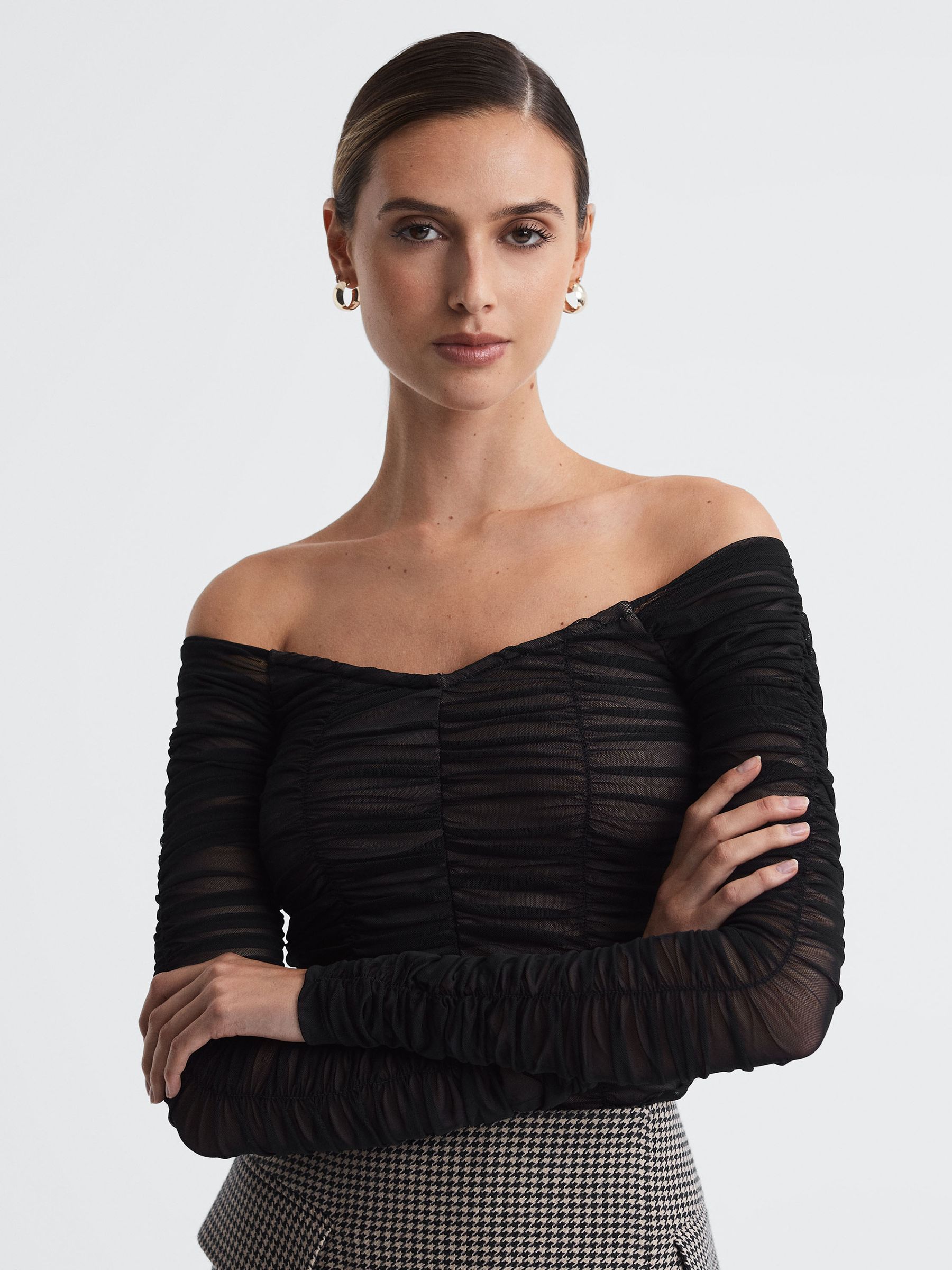 Good American Ruched Off-The-Shoulder Top in Black - Image 1 of 5 Good American Ruched Off-The-Shoulder Top in Black - Image 1 of 5