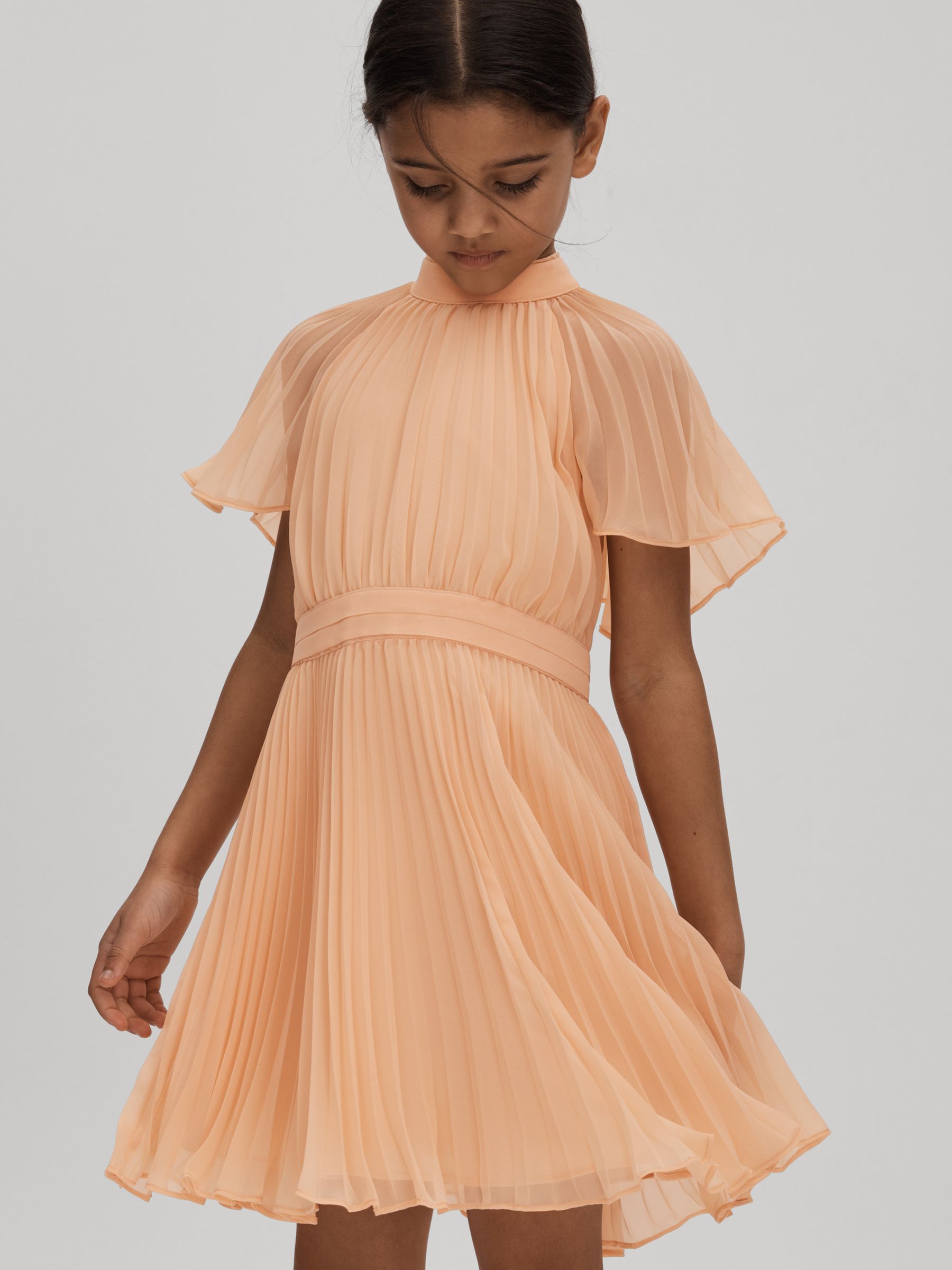 Teen Pleated Cape Sleeve Dress in Apricot - Image 2 of 4 Teen Pleated Cape Sleeve Dress in Apricot - Image 2 of 4