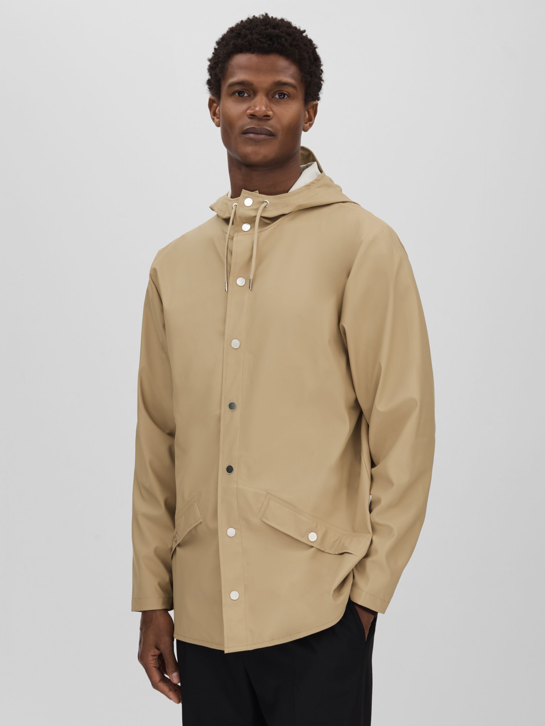 Rains Unisex Hooded Raincoat in Sand - Image 1 of 6