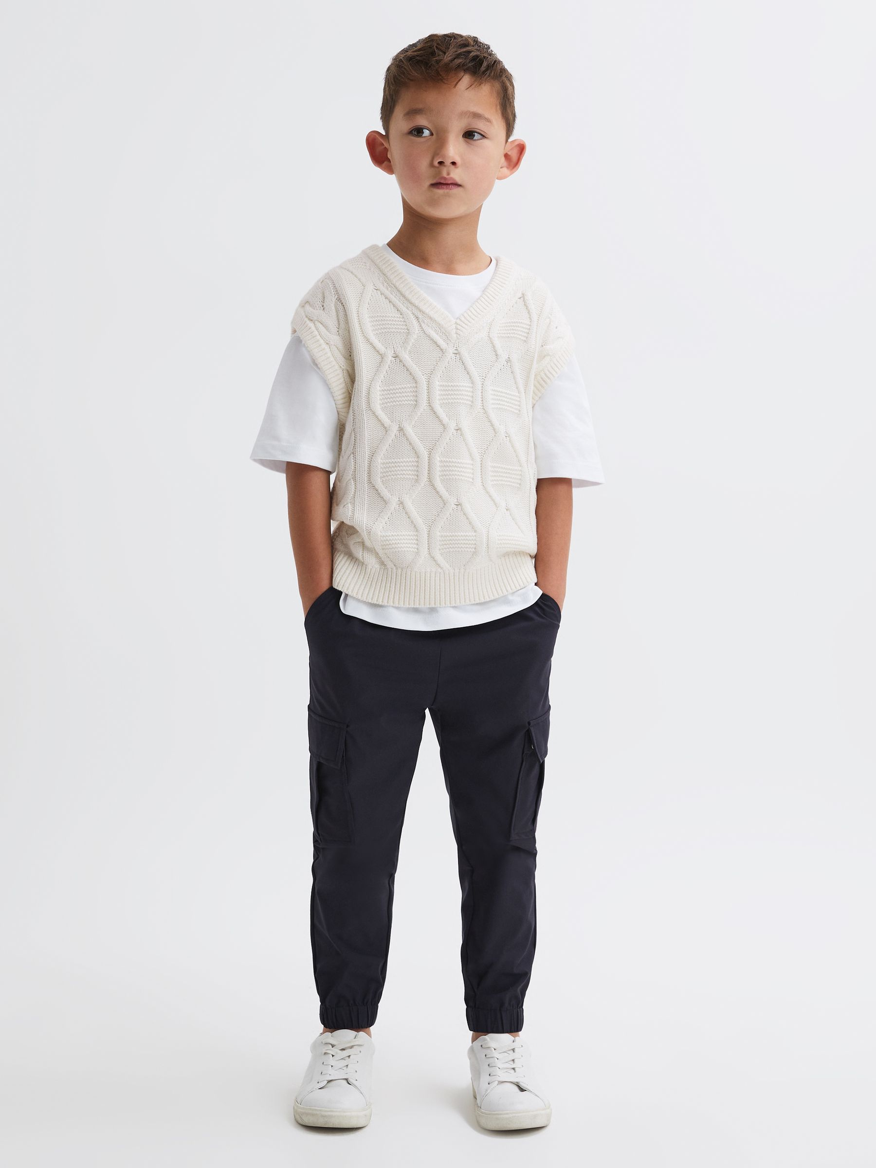 3-9 yrs Slim Fit Cable Knit Sleeveless Vest in Ecru - Image 1 of 5