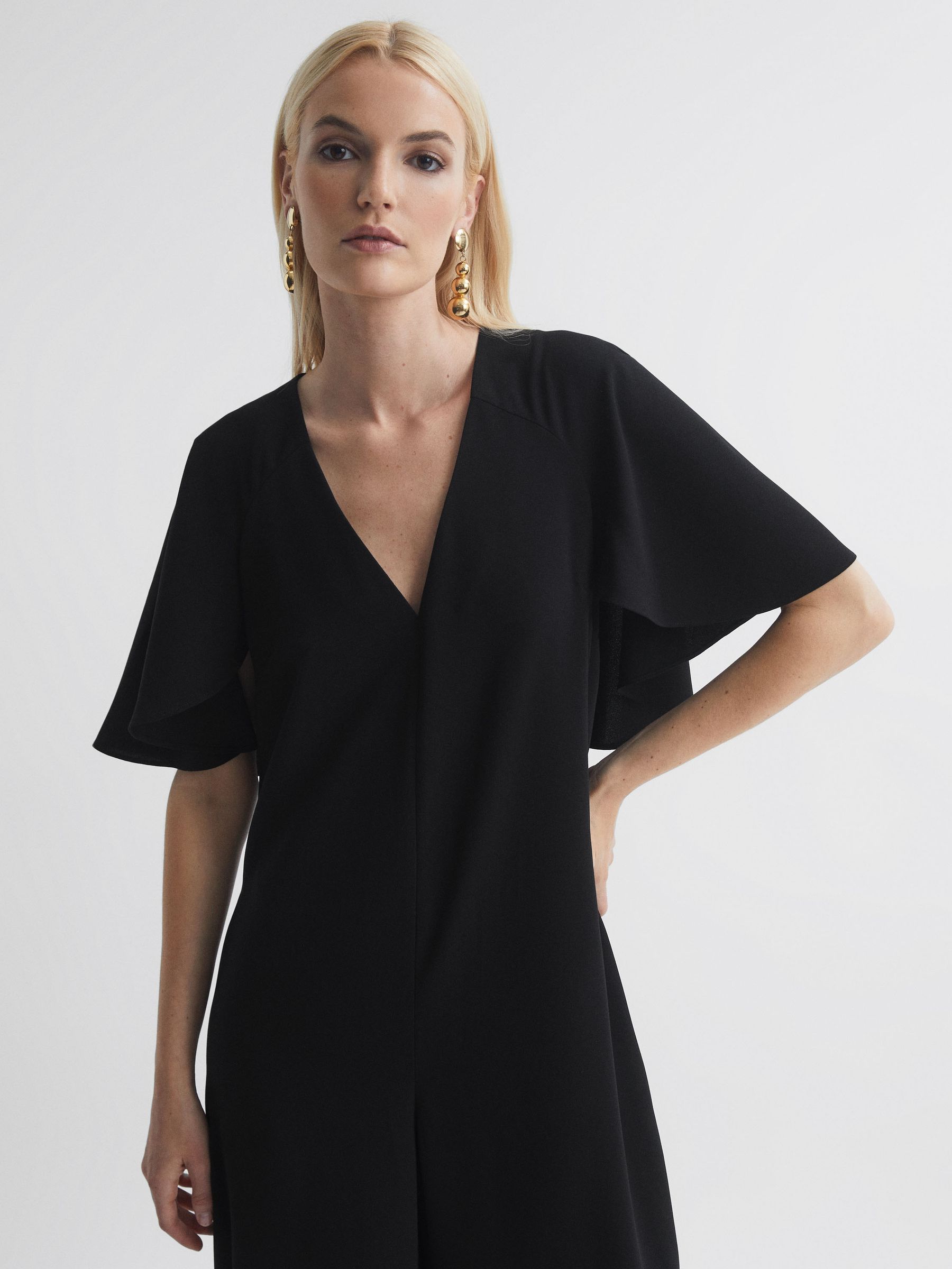 Florere Relaxed Fit Cape Sleeve Jumpsuit in Black - Image 4 of 7