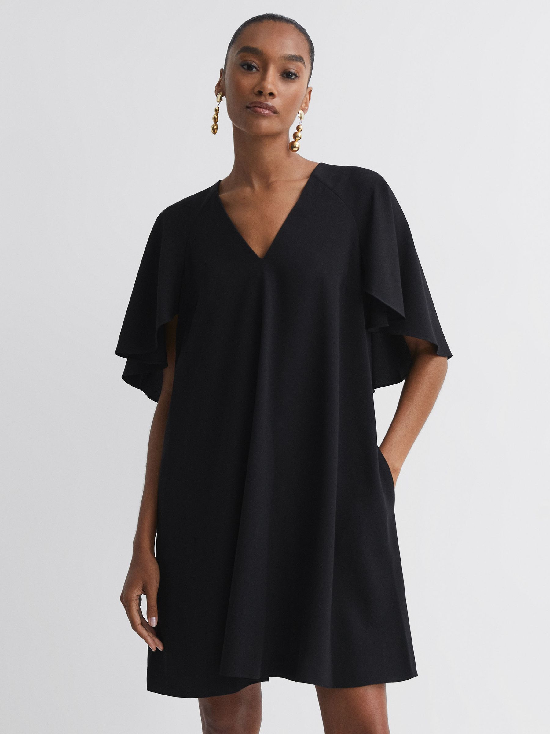 Florere Relaxed Fit Cape Sleeve Mini Dress in Black - Image 1 of 5