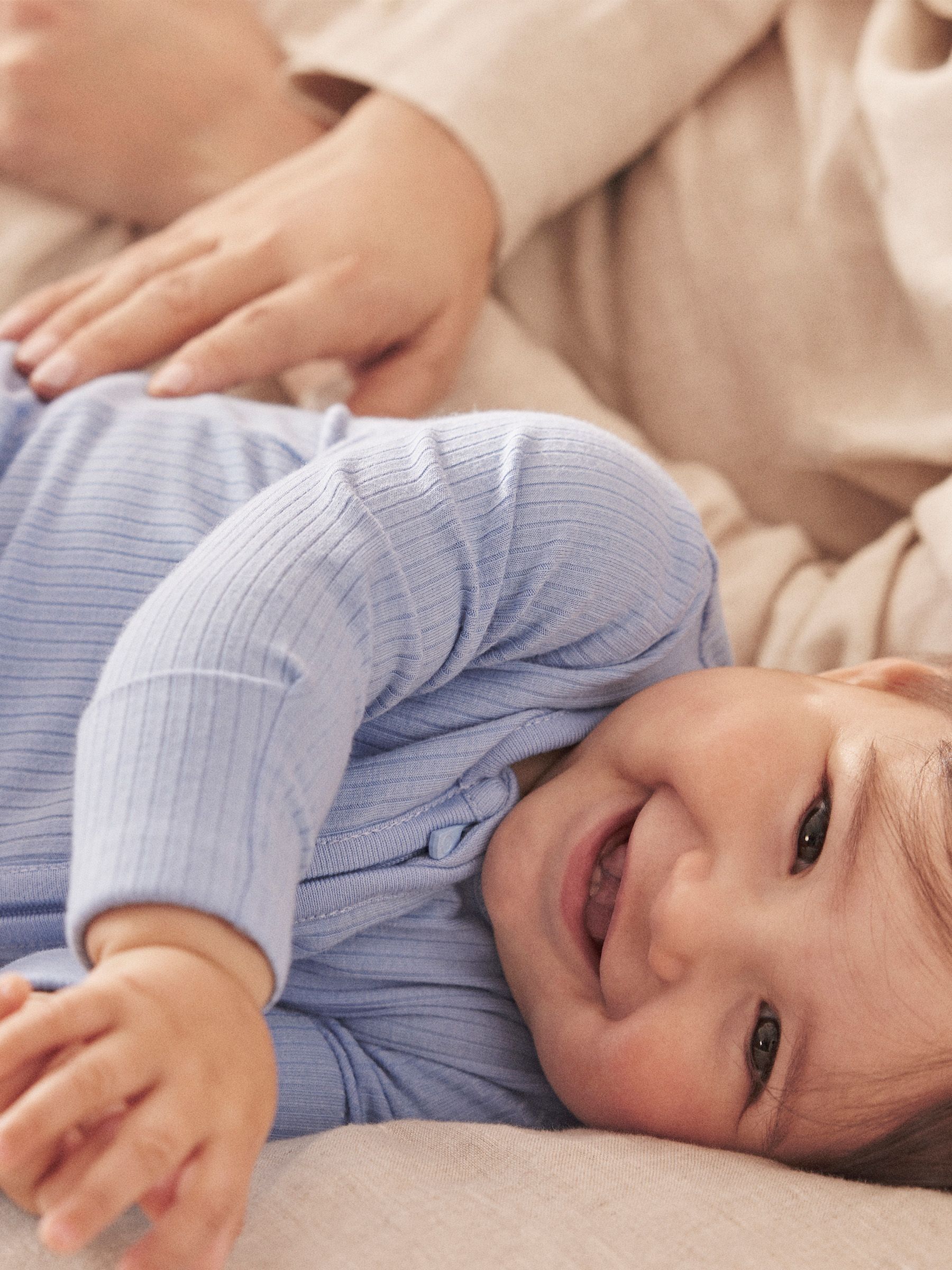 MORI Sky Blue Stretch Supersoft 2 Way Zip Sleepsuit - Image 1 of 6 MORI Sky Blue Stretch Supersoft 2 Way Zip Sleepsuit - Image 1 of 6