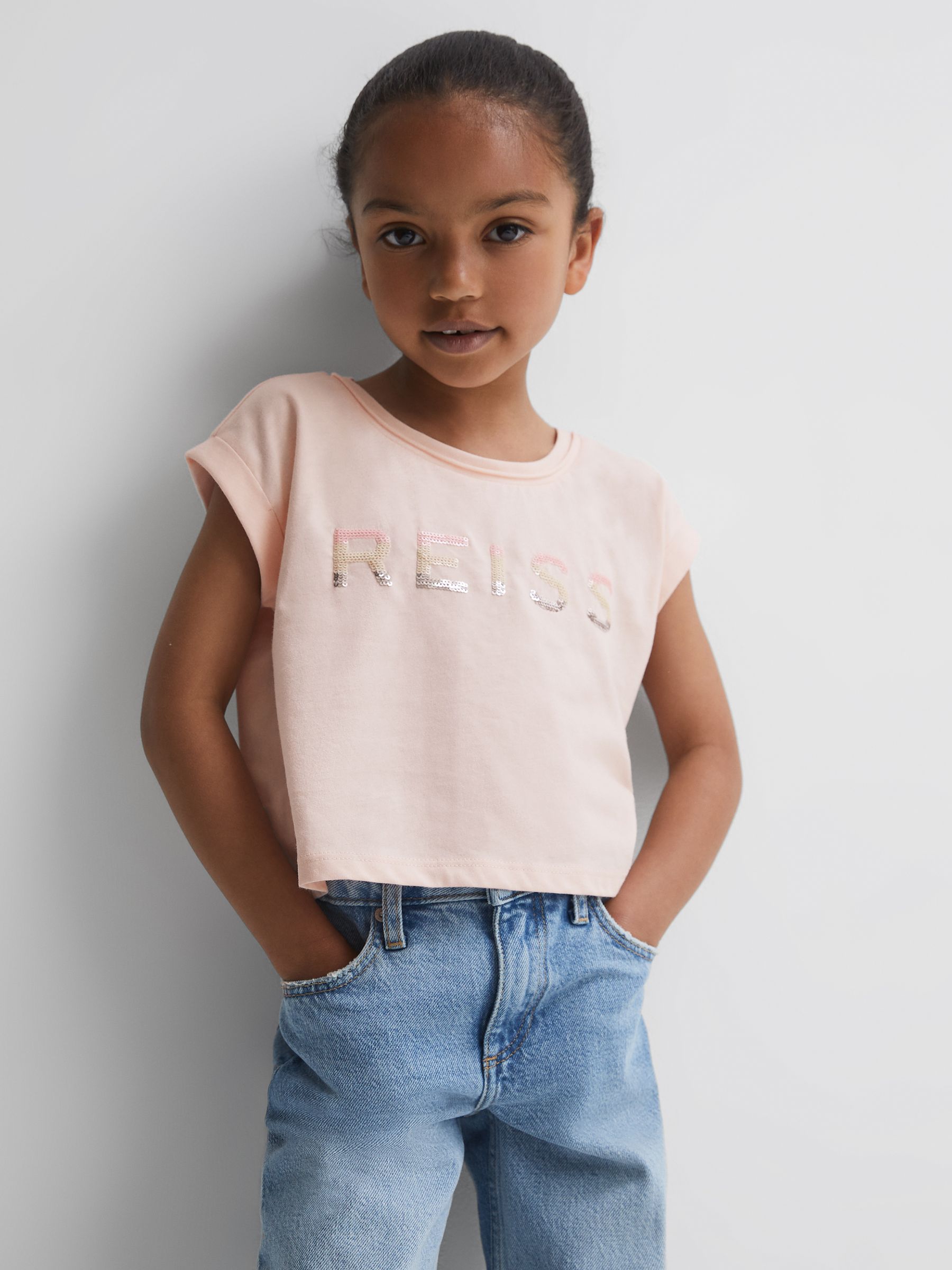 4-9 yrs Cotton Crew Neck Cropped T-Shirt in Pink - Image 1 of 6 4-9 yrs Cotton Crew Neck Cropped T-Shirt in Pink - Image 1 of 6