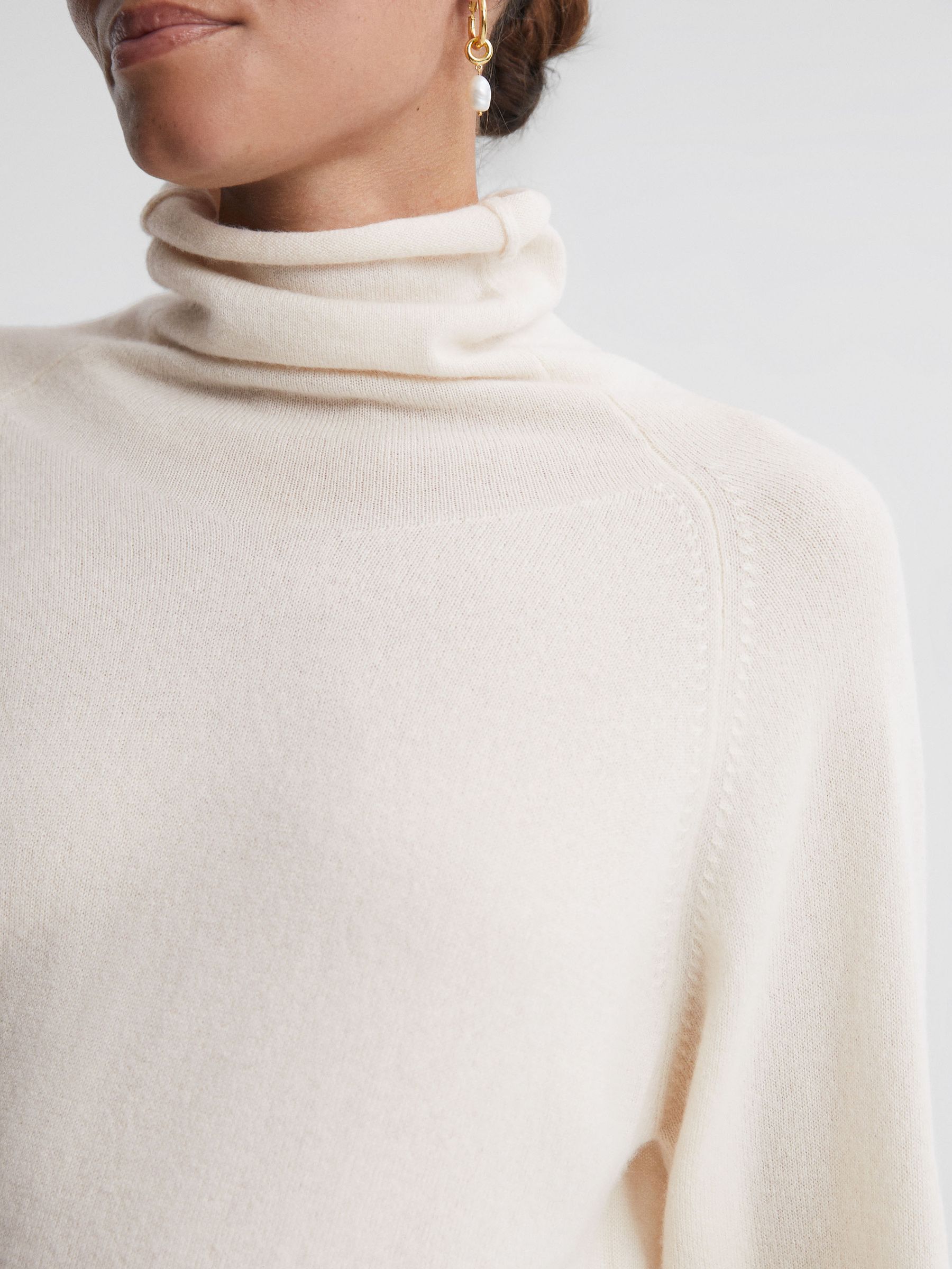 Relaxed Cashmere Roll Neck Top in Cream - Image 1 of 7 Relaxed Cashmere Roll Neck Top in Cream - Image 1 of 7
