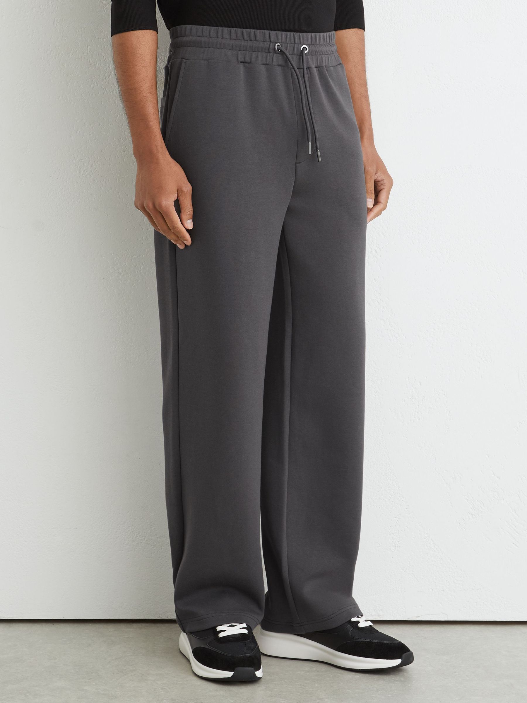 Premium Interlock Relaxed-Fit Joggers in Charcoal Grey - Image 4 of 6