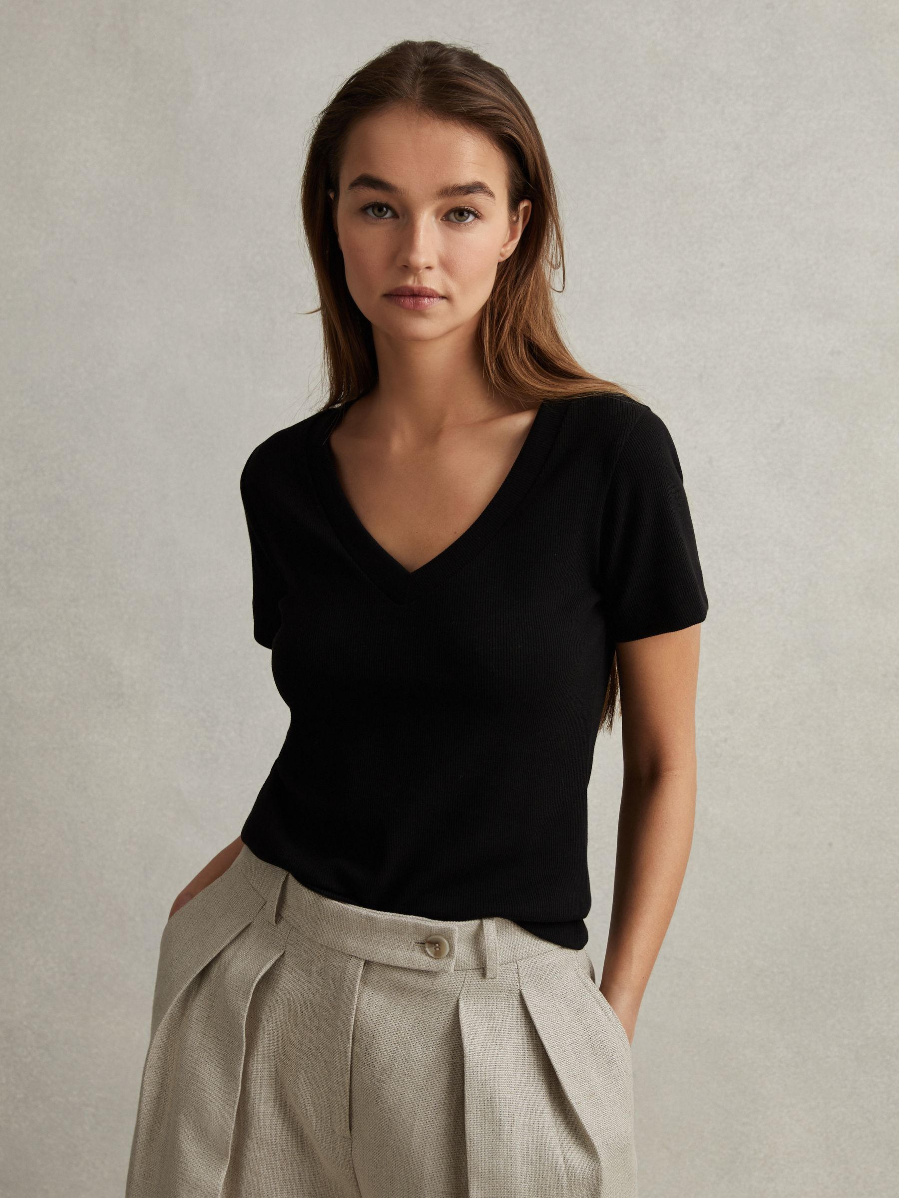 Cotton Blend Ribbed V-Neck Top in Black - Image 1 of 6