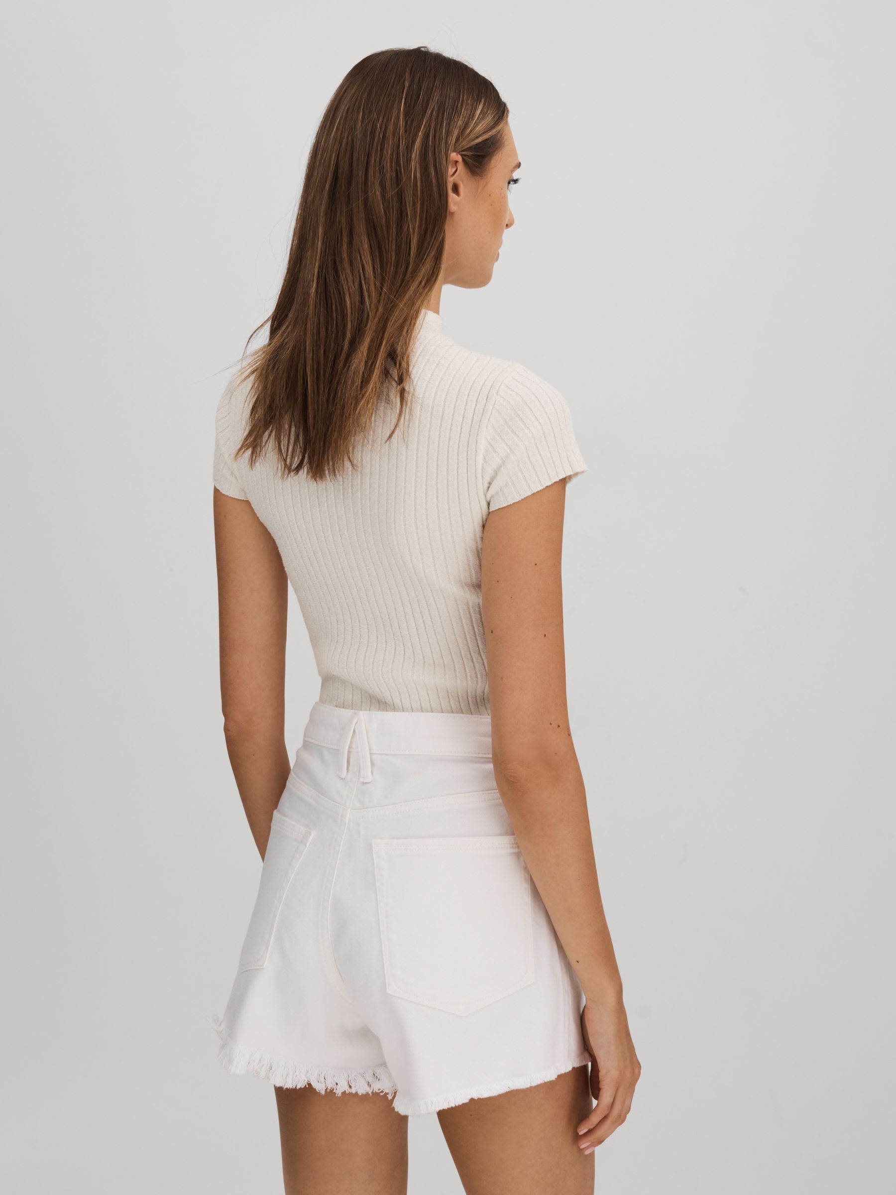 Good American Raw Hem Denim Shorts in White - Image 3 of 4