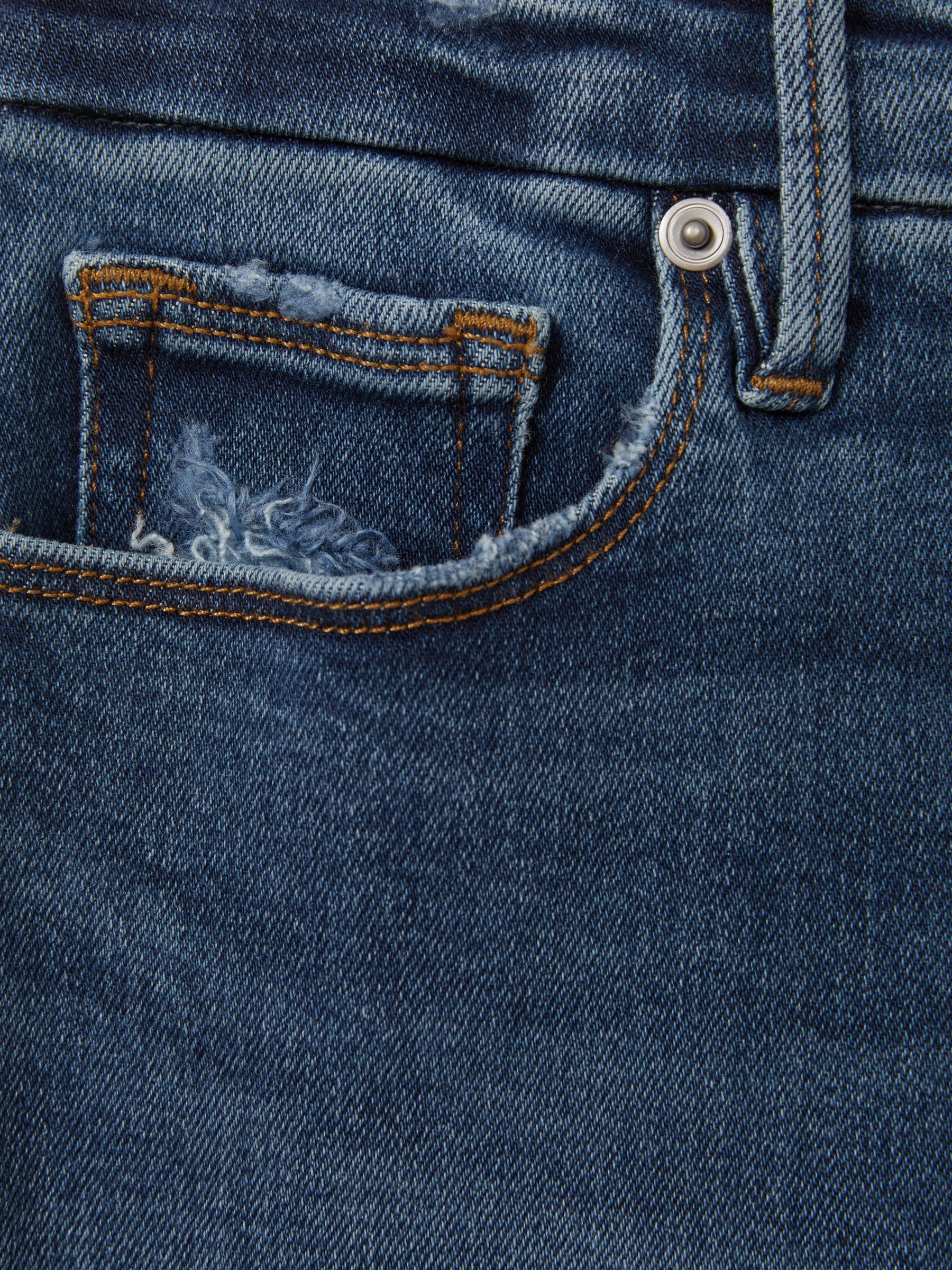Good American Mid Rise Raw Hem Skinny Jeans in Indigo - Image 2 of 2