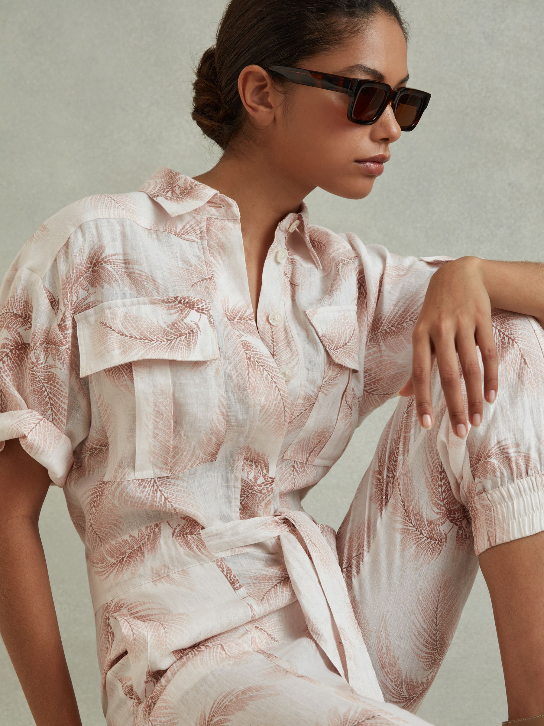 Linen Tropical Print Belted Jumpsuit in Blush - Image 1 of 5