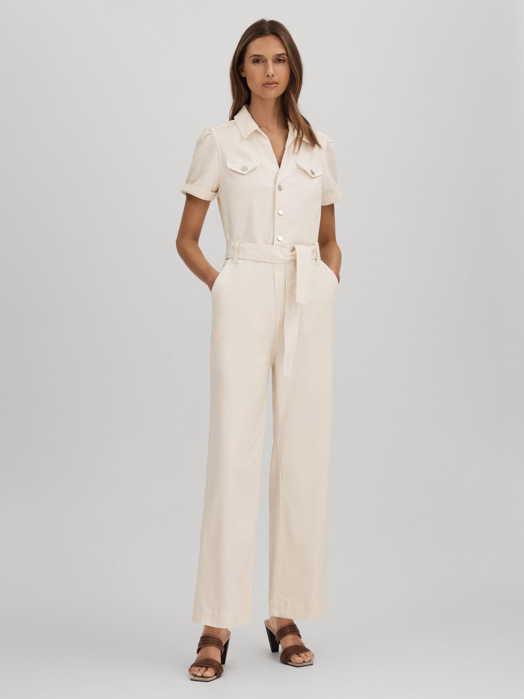 Paige Denim Puff Sleeve Jumpsuit in Sand - Image 1 of 5