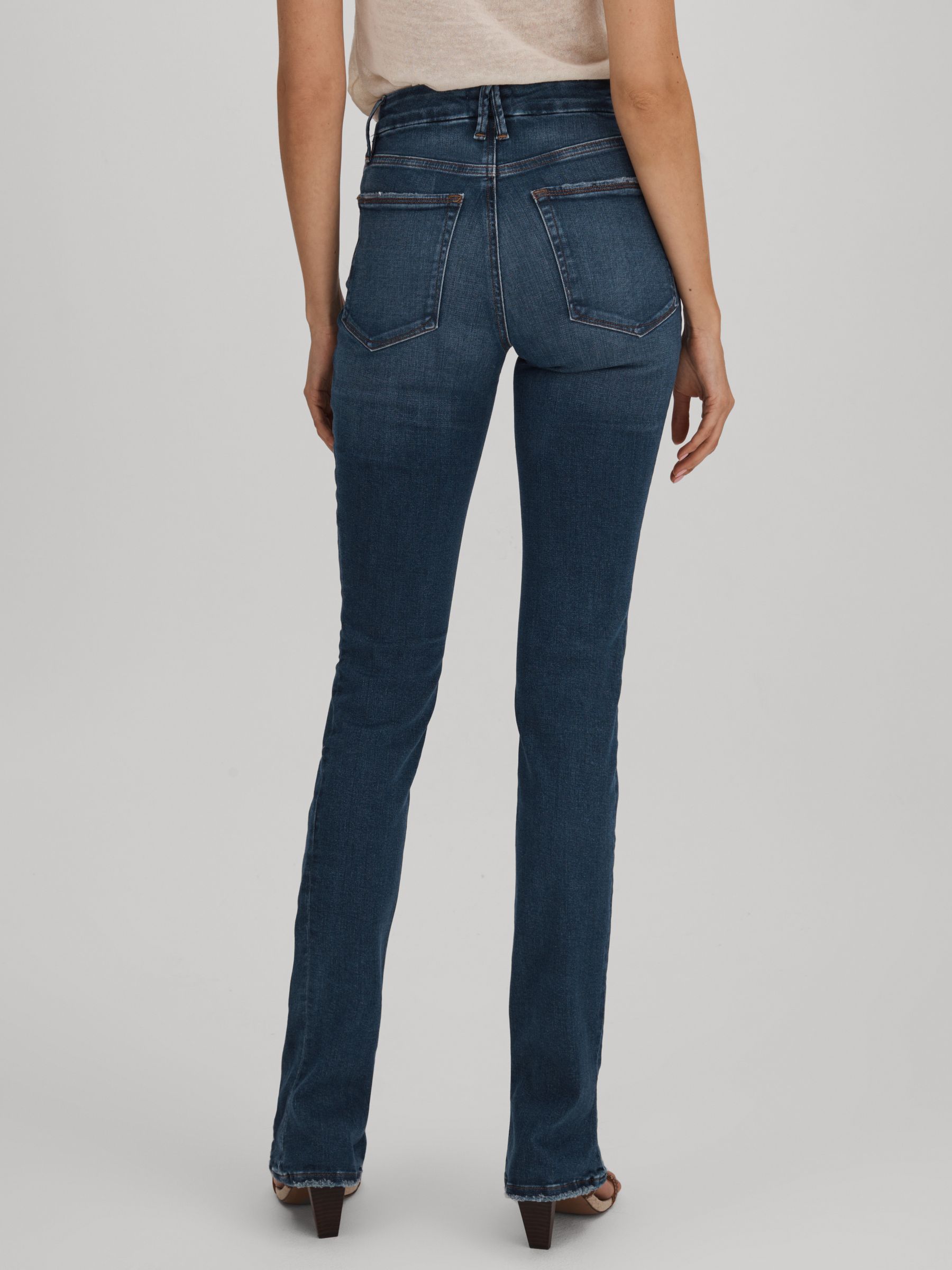 Good American Distressed Bootcut Jeans in Indigo - Image 4 of 5