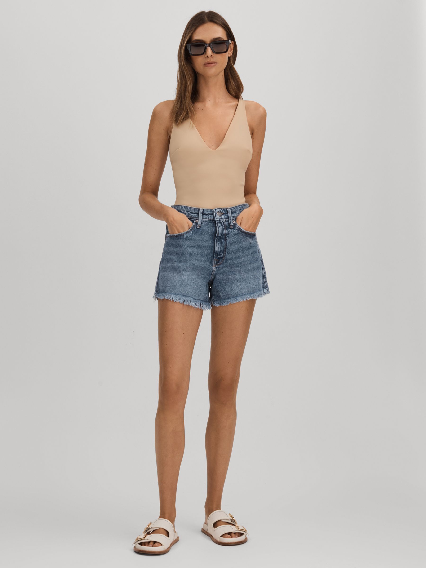 Good American Raw Hem Denim Shorts in Indigo - Image 1 of 4