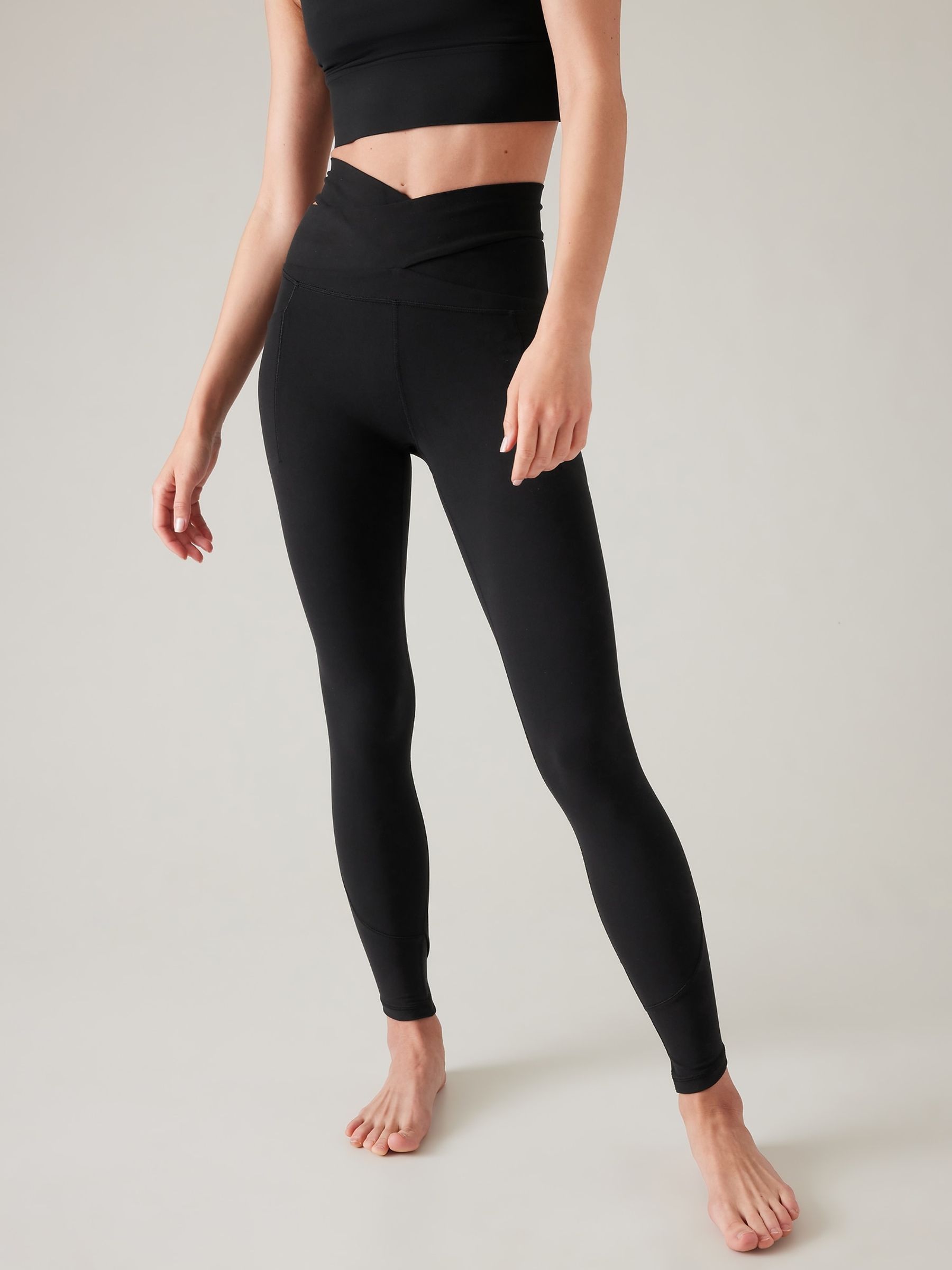 Athleta Black Salutation Stash Wrap Leggings - Image 1 of 4
