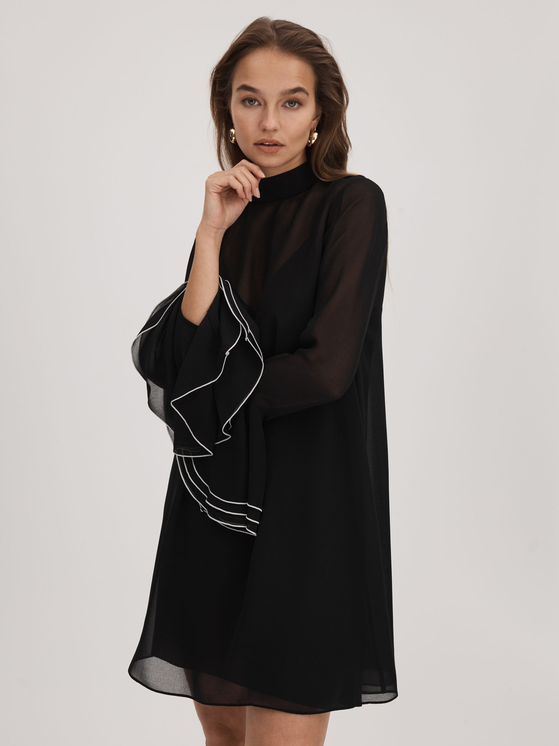 Florere Sheer Fluted Cuff Mini Dress in Black - Image 1 of 6