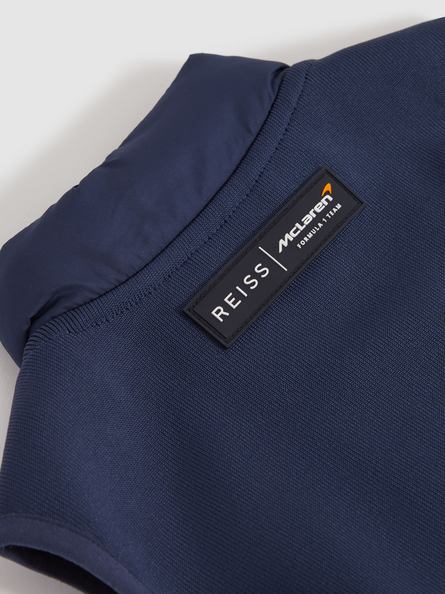 9-13 yrs McLaren F1 Hybrid Quilt and Knit Gilet in Airforce Blue - Image 12 of 12