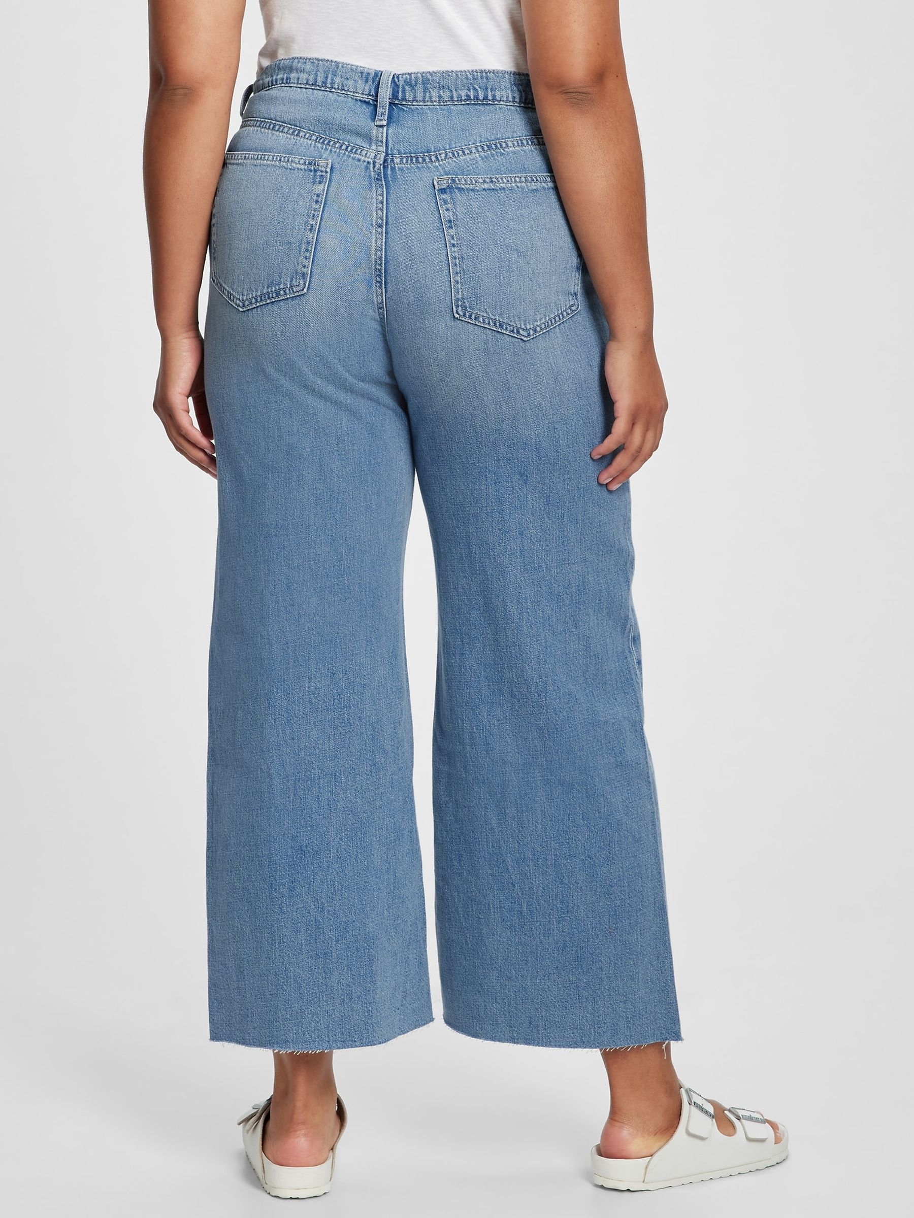 Mid Wash Blue High Waisted Raw Hem Wide Leg Jeans - Image 5 of 7