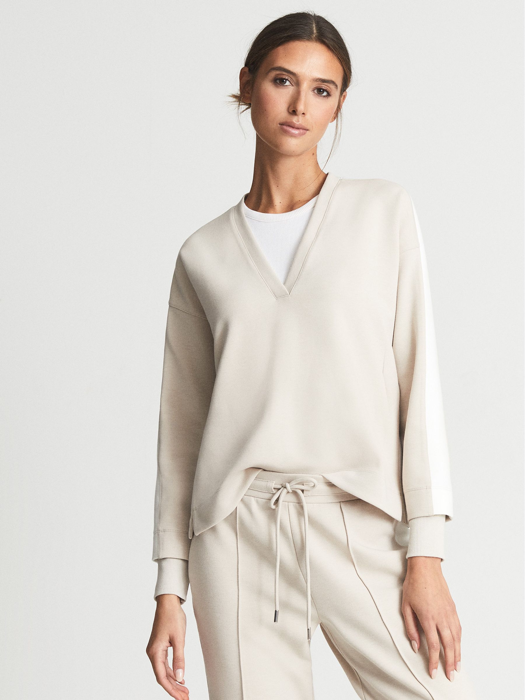 Reiss Cape Sleeve V-Neck Jumpsuit in Ivory | REISS
