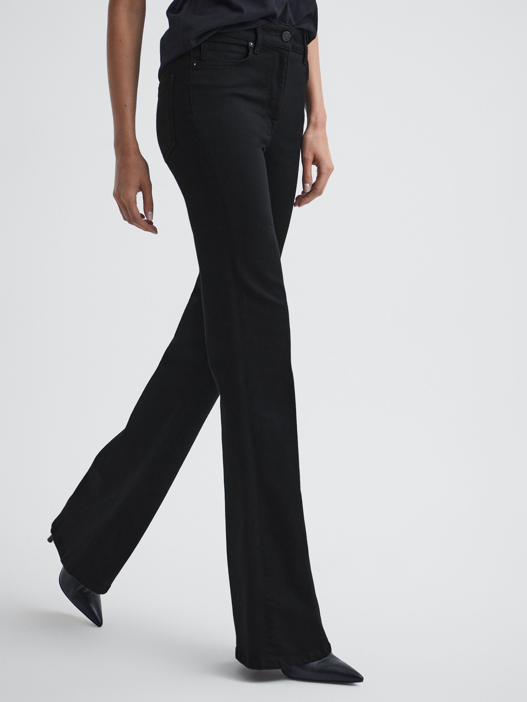 Petite High Rise Skinny Flared Jeans in Black - Image 1 of 8