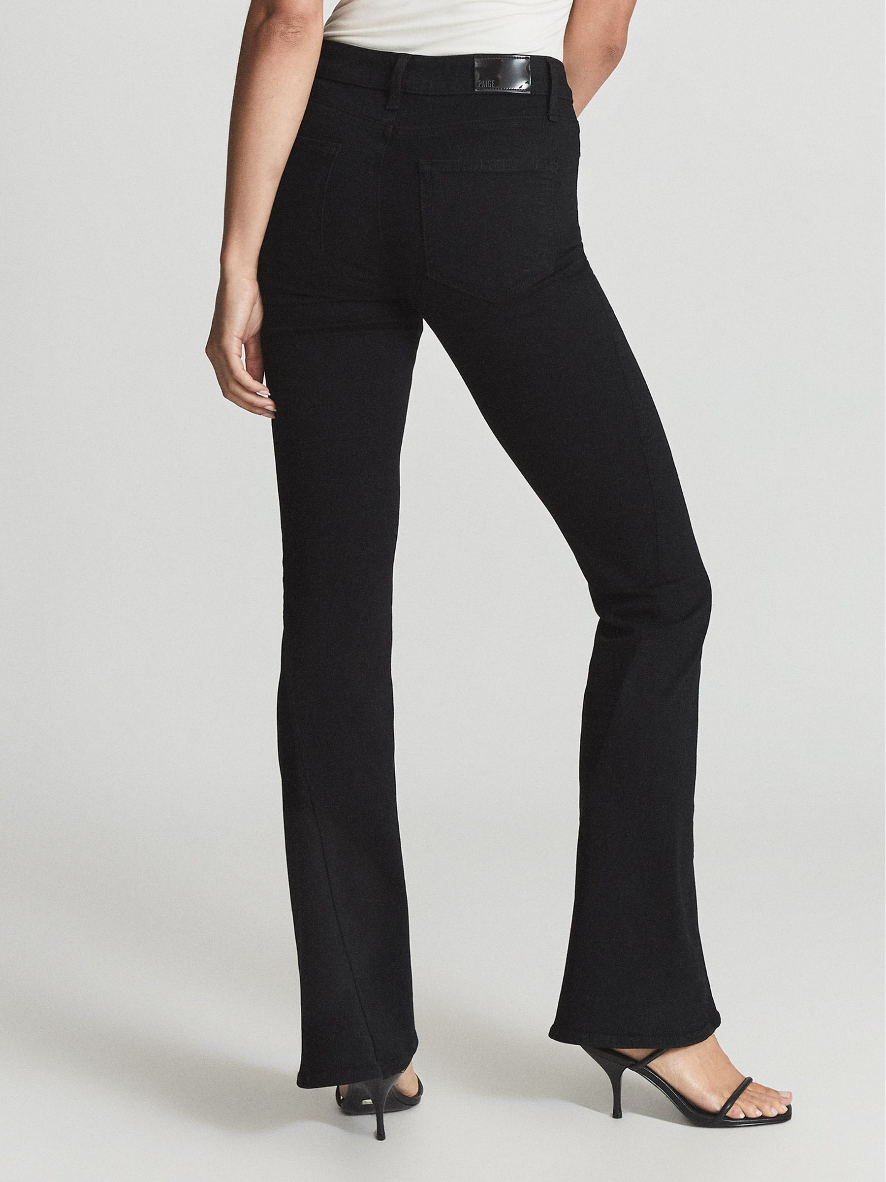 Paige High Rise Twisted Seam Flared Jeans in Black - Image 4 of 4