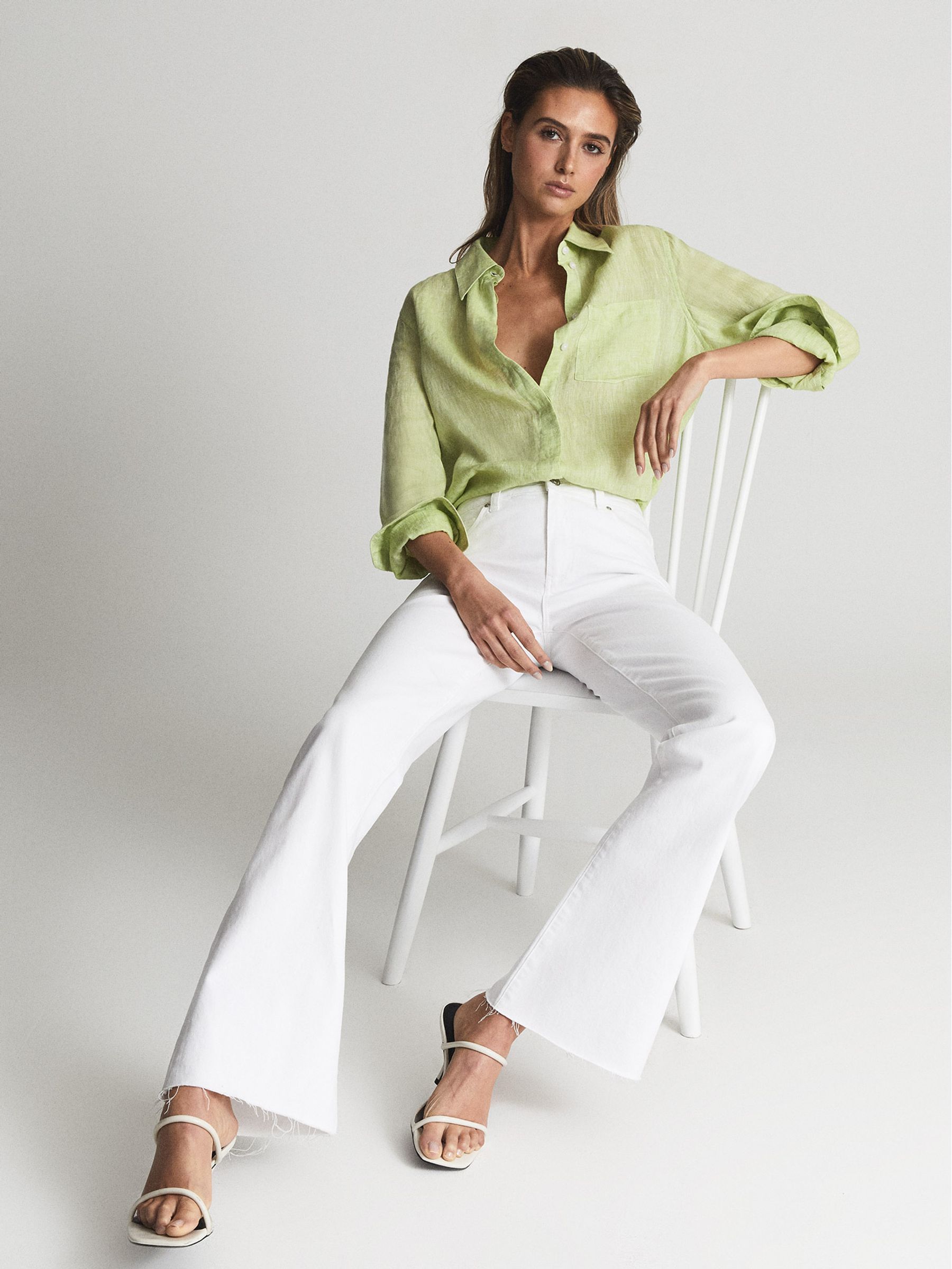 Paige High Rise Raw Hem Flared Jeans in White - Image 3 of 8