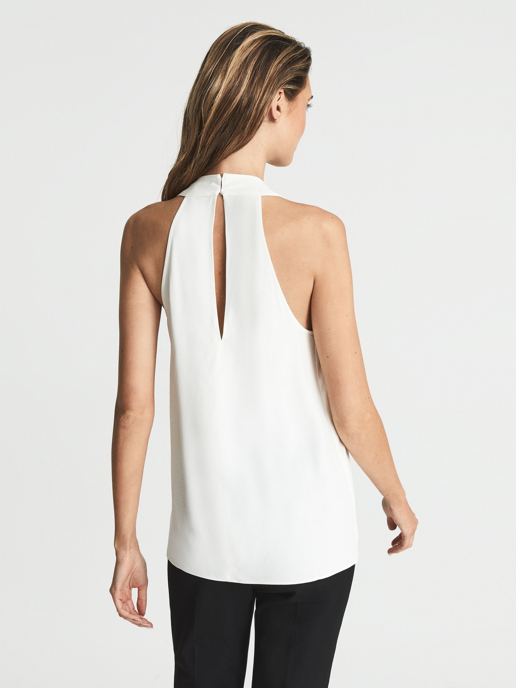 Ensfarvet ærmeløs top i sort/hvid - Billede 5 af 5