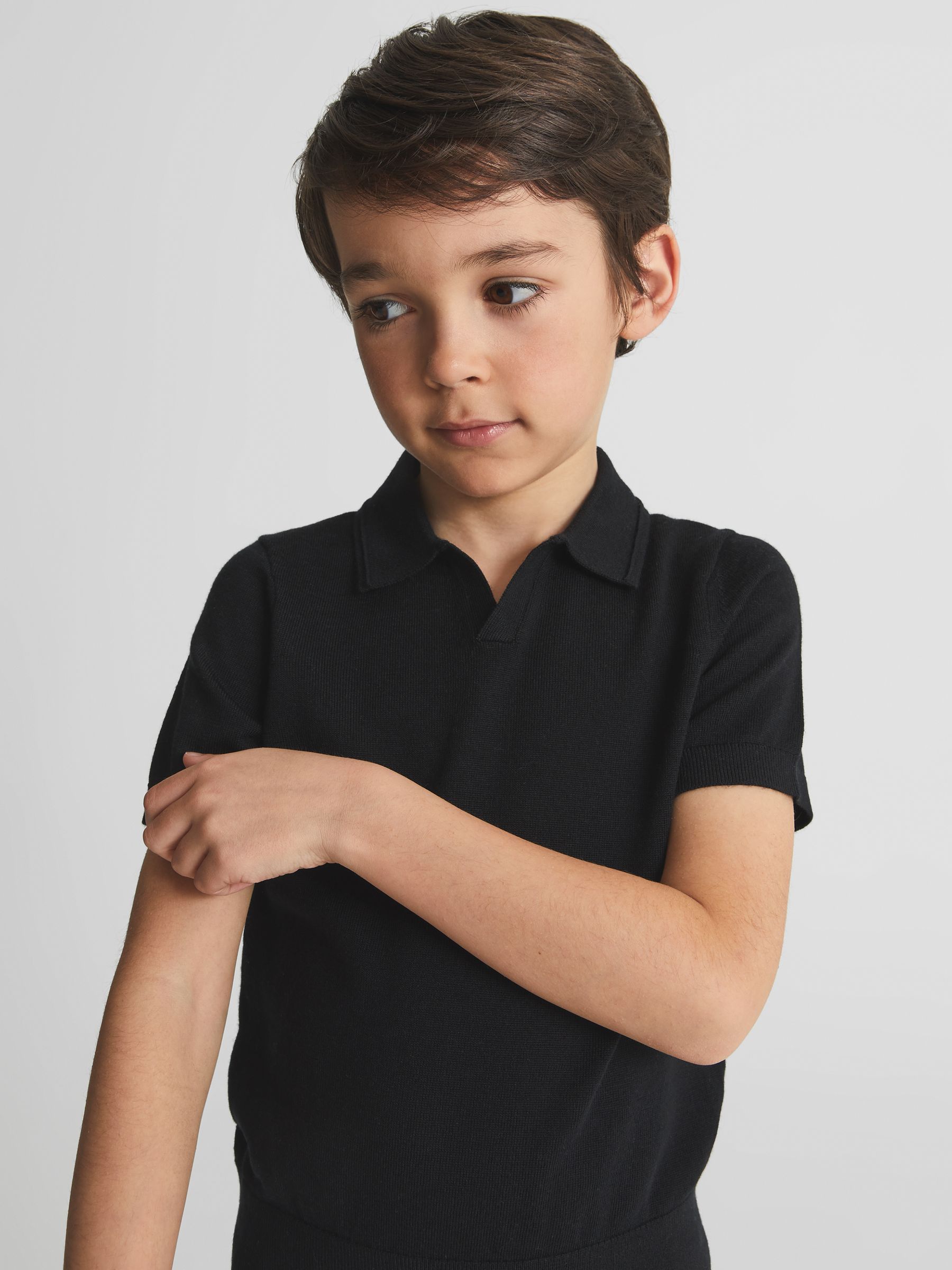 Merino Wool Open Collar Polo Shirt in Black - Image 1 of 6
