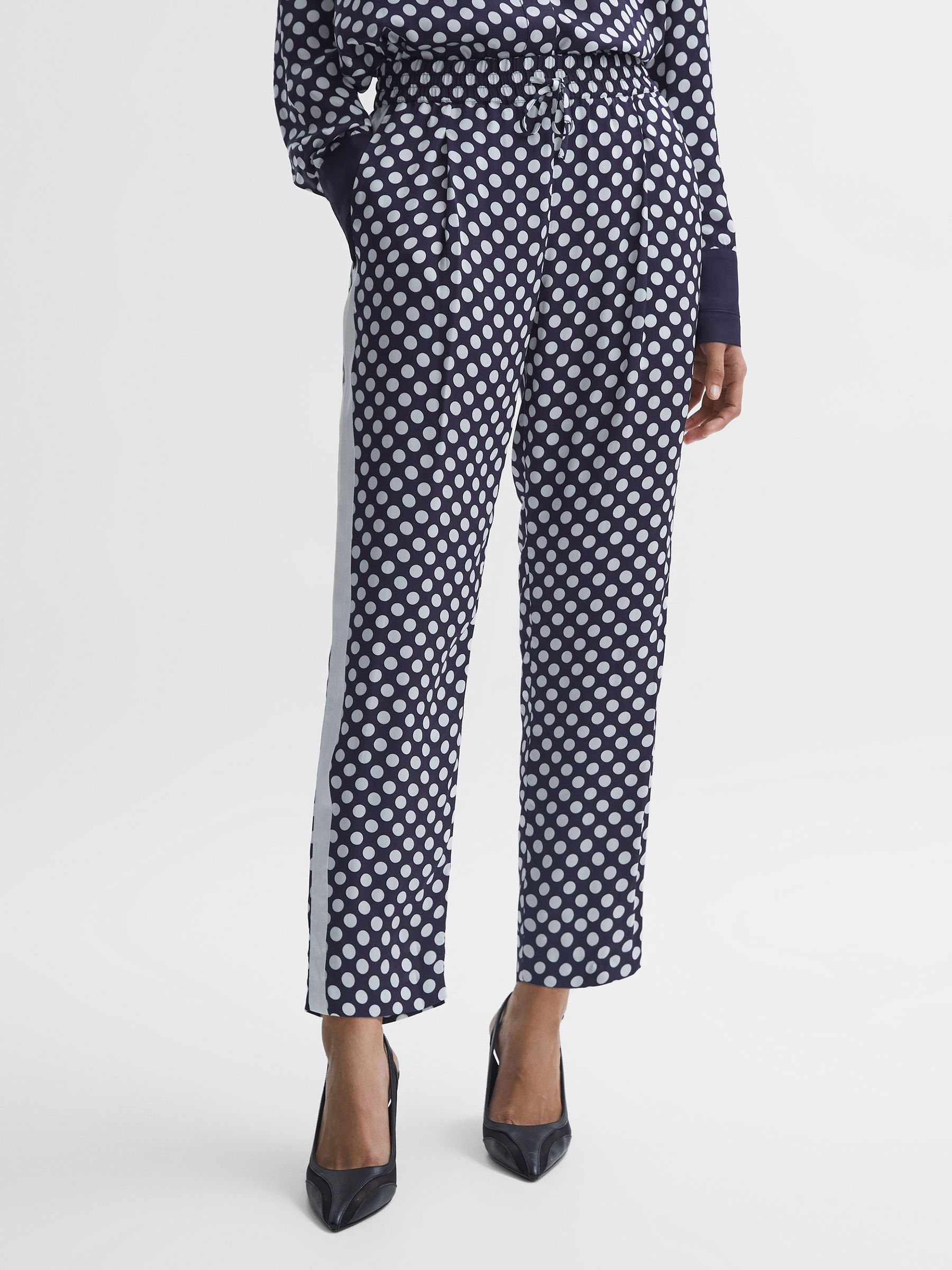 Petite Polka Dot Drawstring Tapered Trousers in Navy/White - Image 1 of 6
