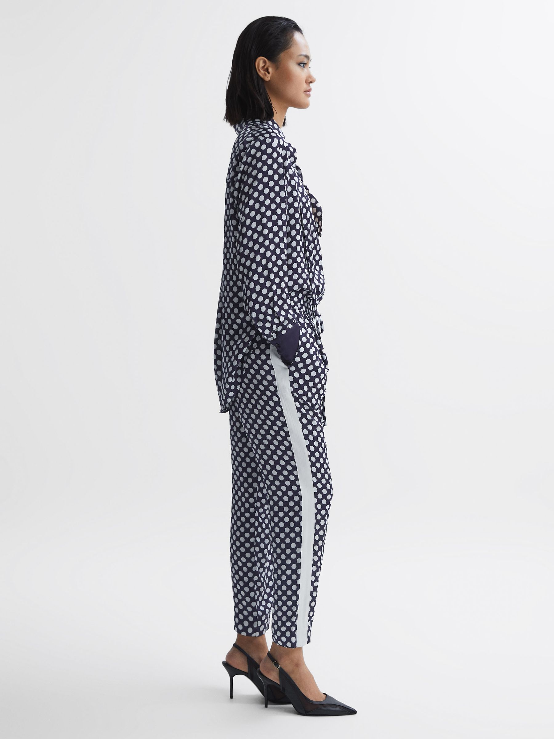 Polka Dot Drawstring Tapered Trousers in Navy/White - Image 1 of 5