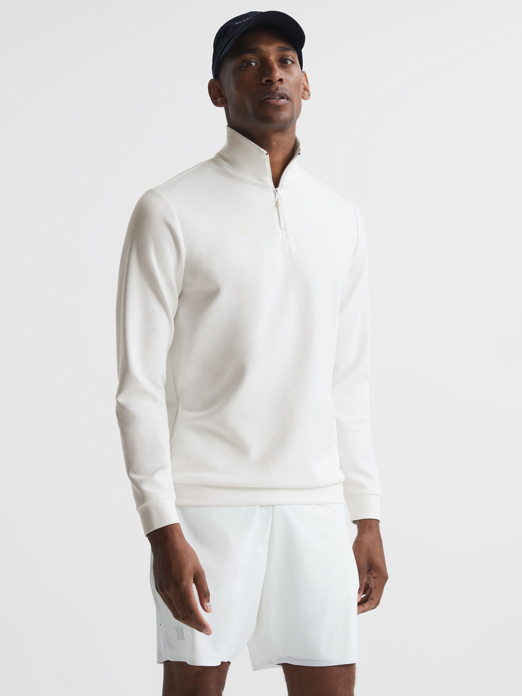 Castore Zip Neck Bonded Polo in White - Image 1 of 7 Castore Zip Neck Bonded Polo in White - Image 1 of 7