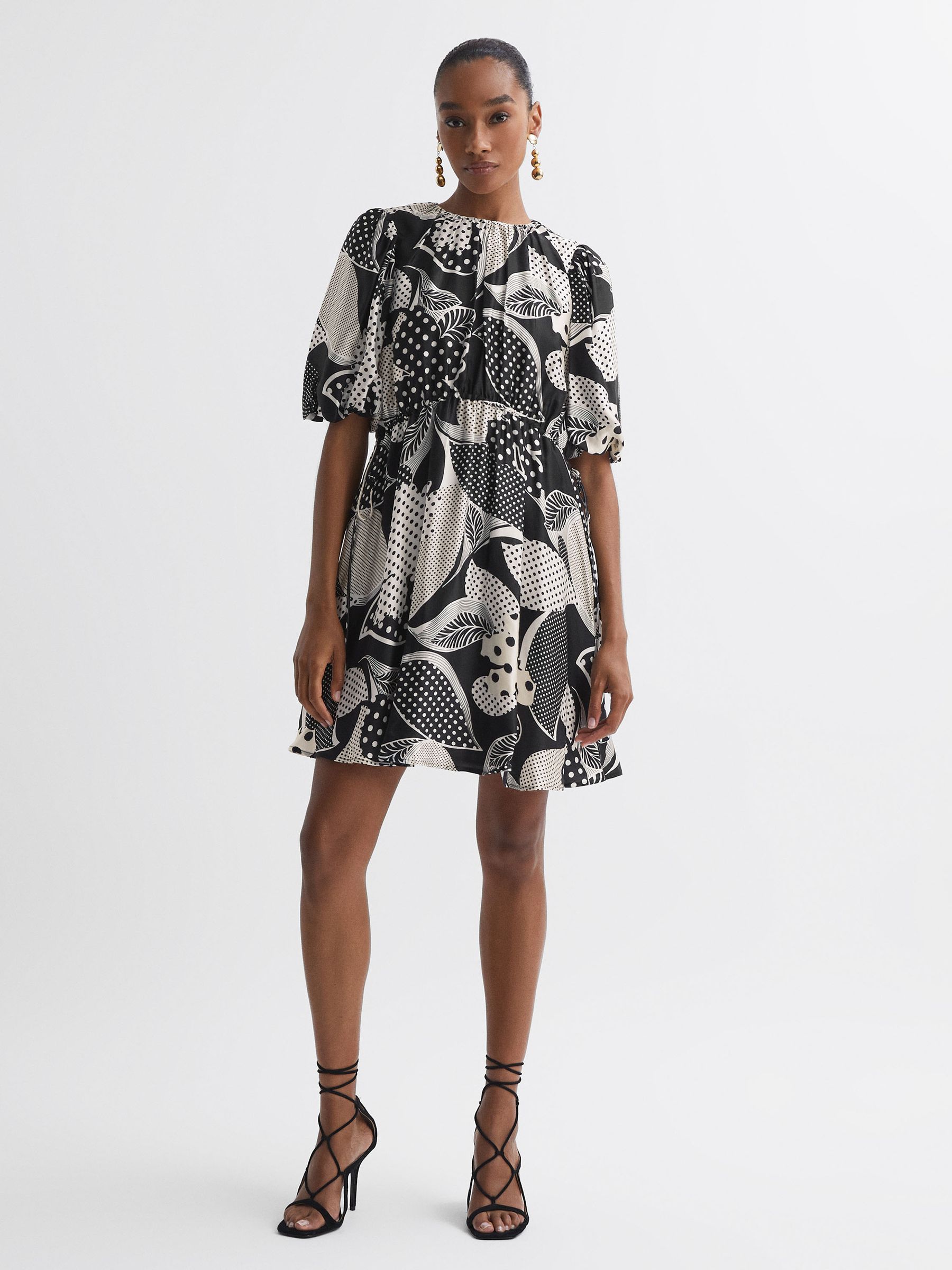 Florere Polka Dot Puff Sleeve Mini Dress in Black - Image 1 of 5