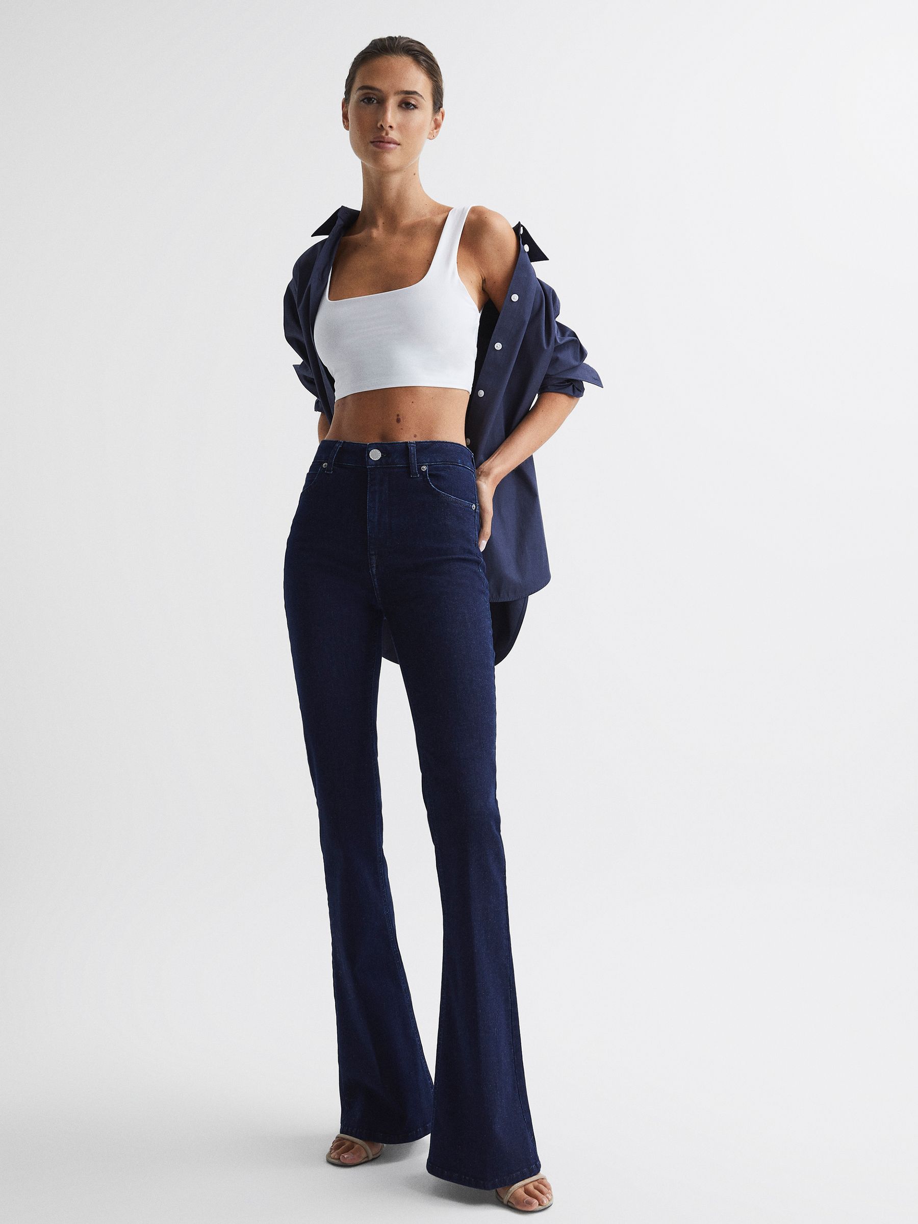 Contour High Rise Flared Jeans in Dark Blue - Image 1 of 9