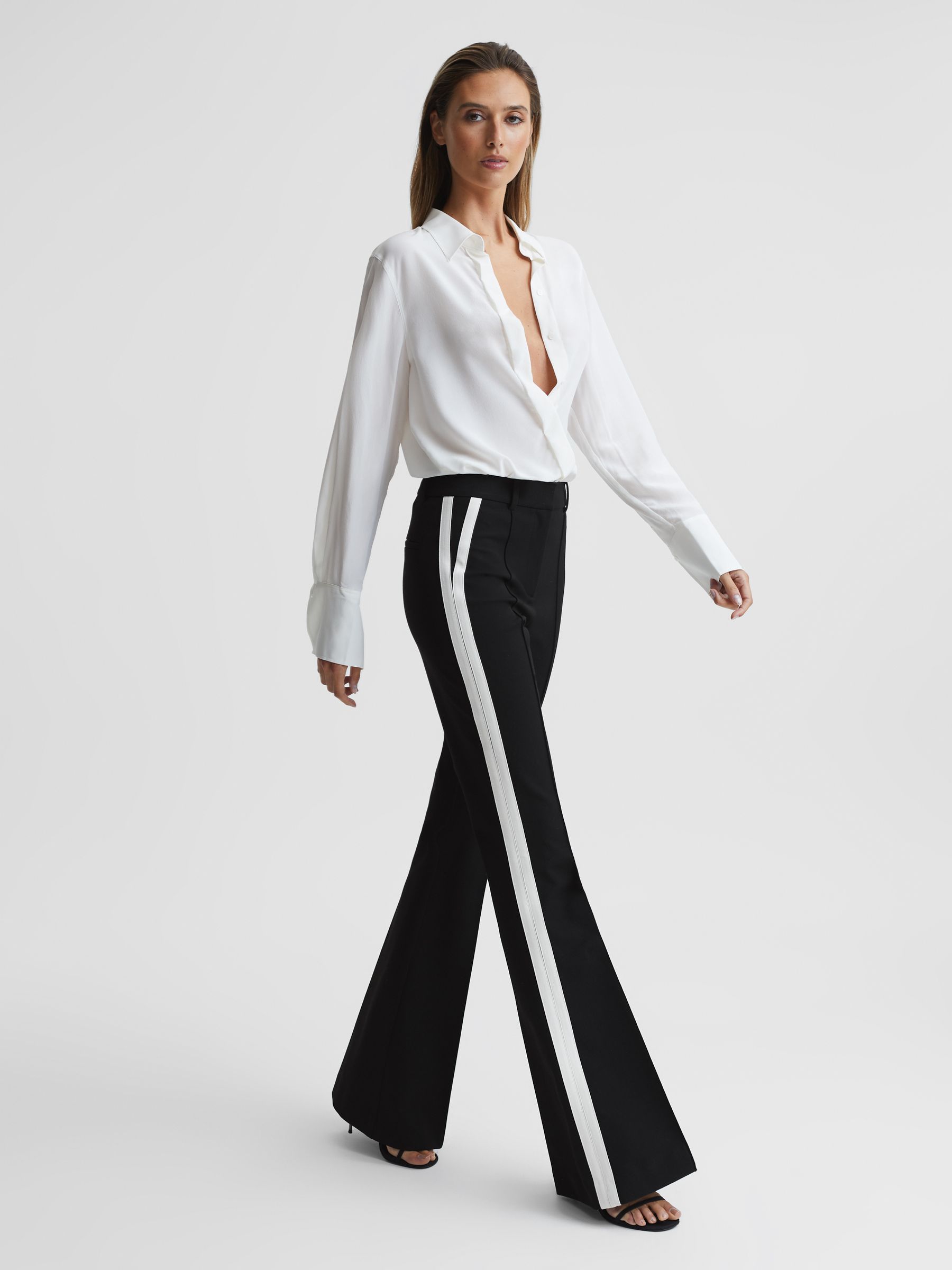 Reiss Petite Flared Side Stripe Trousers in Black REISS