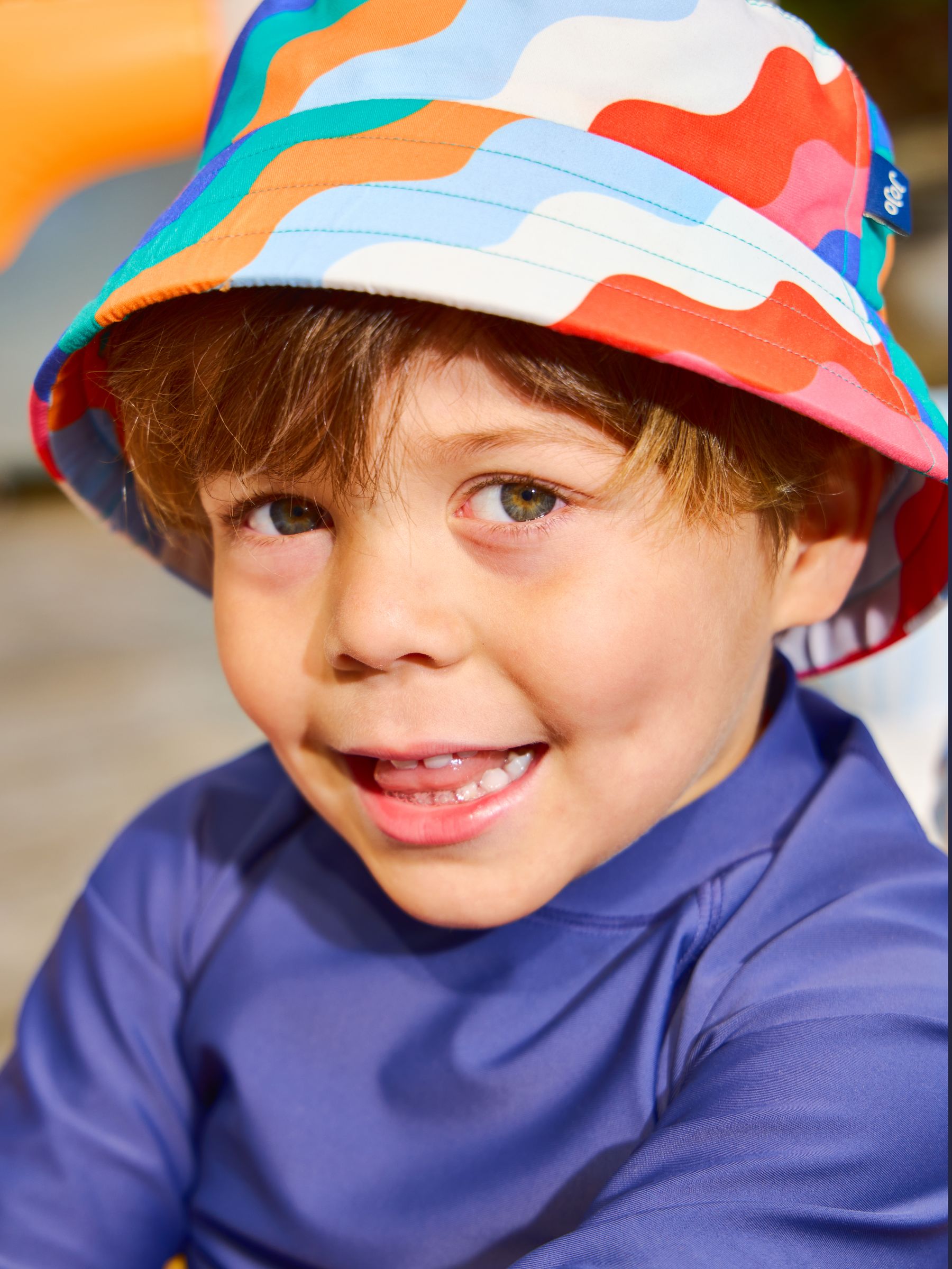 Multi-Coloured Wavy Stripe Bucket Hat - Image 1 of 4 Multi-Coloured Wavy Stripe Bucket Hat - Image 1 of 4