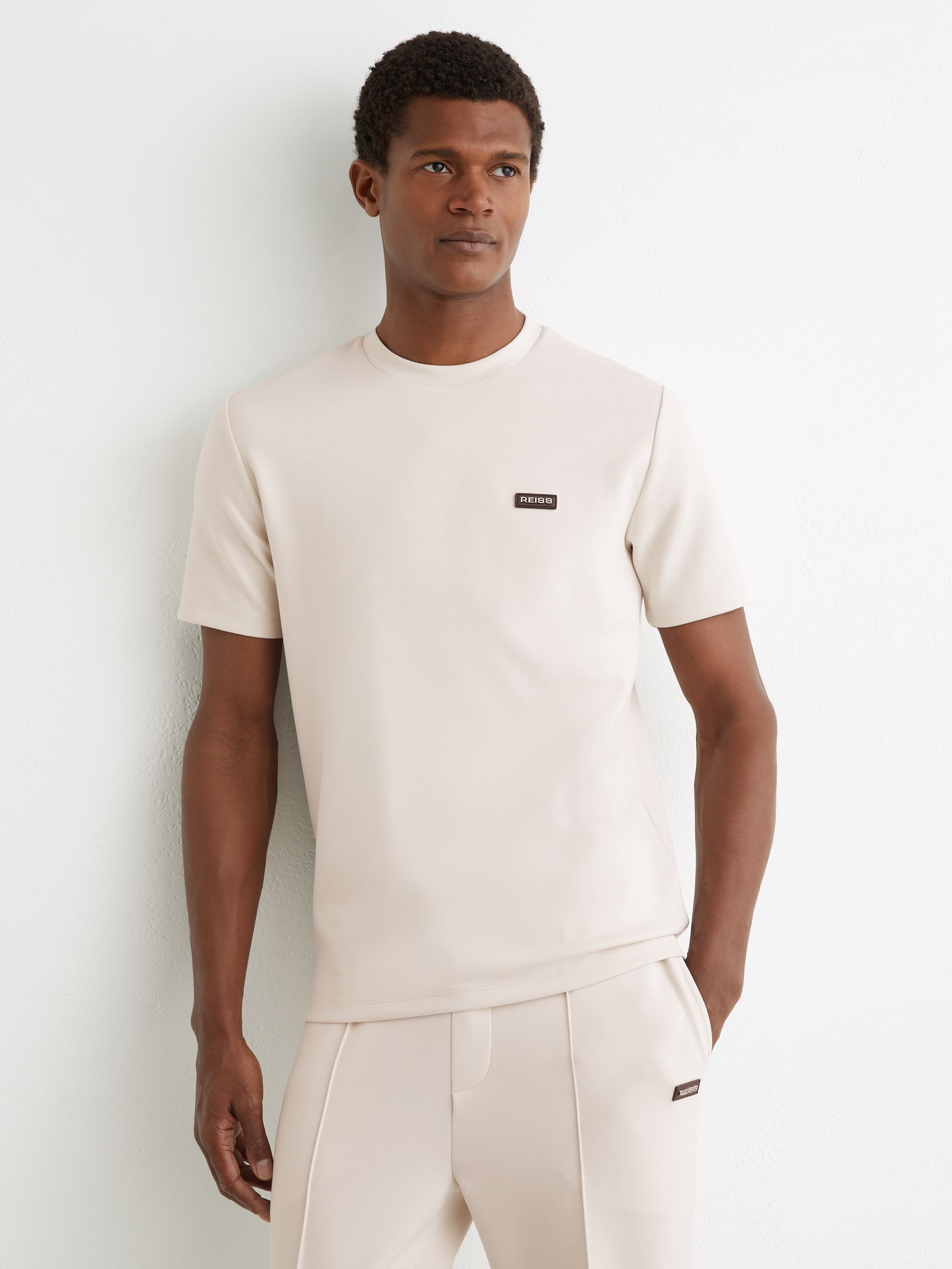 Premium Interlock Logo T-Shirt in Off White - Image 1 of 6