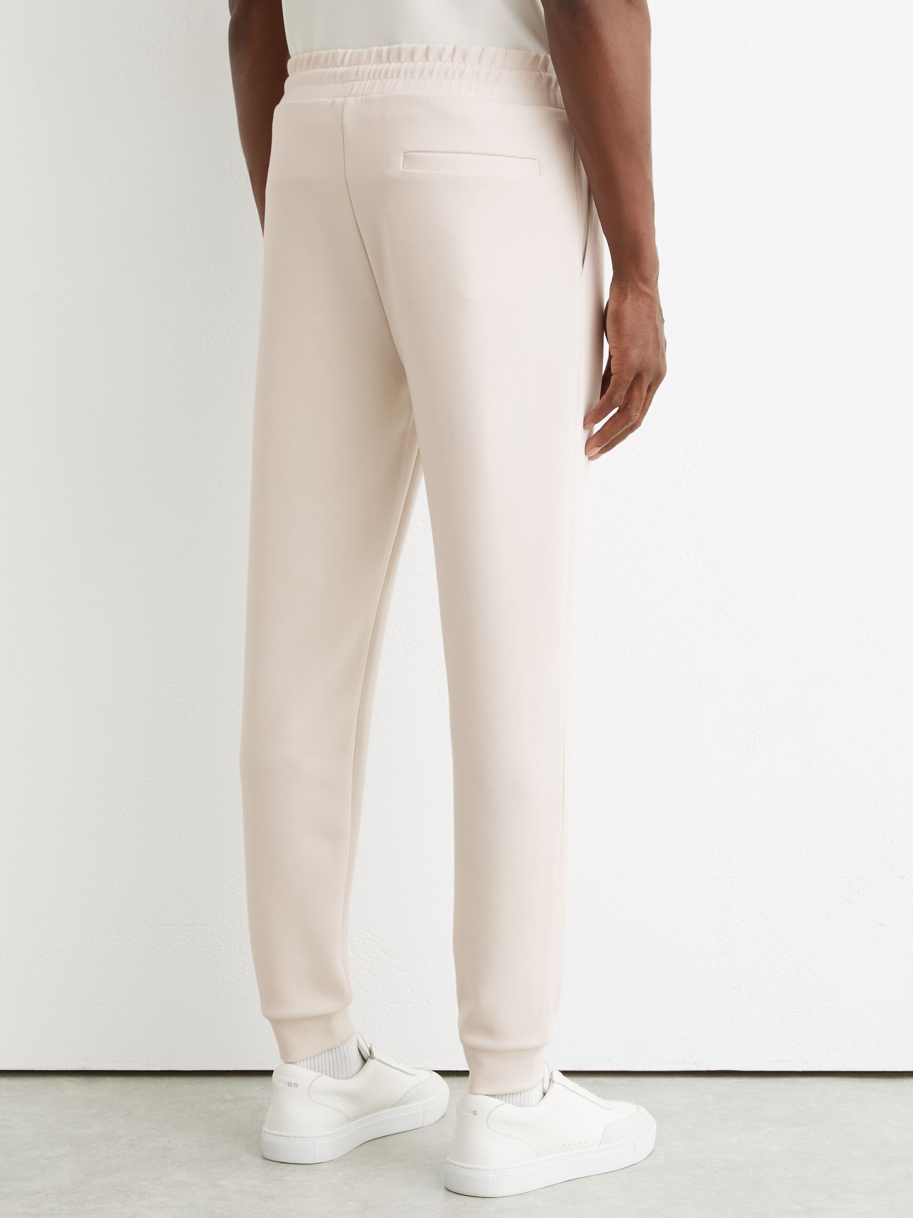 Premium Interlock Cuffed Logo Joggers in Off White - image 3
