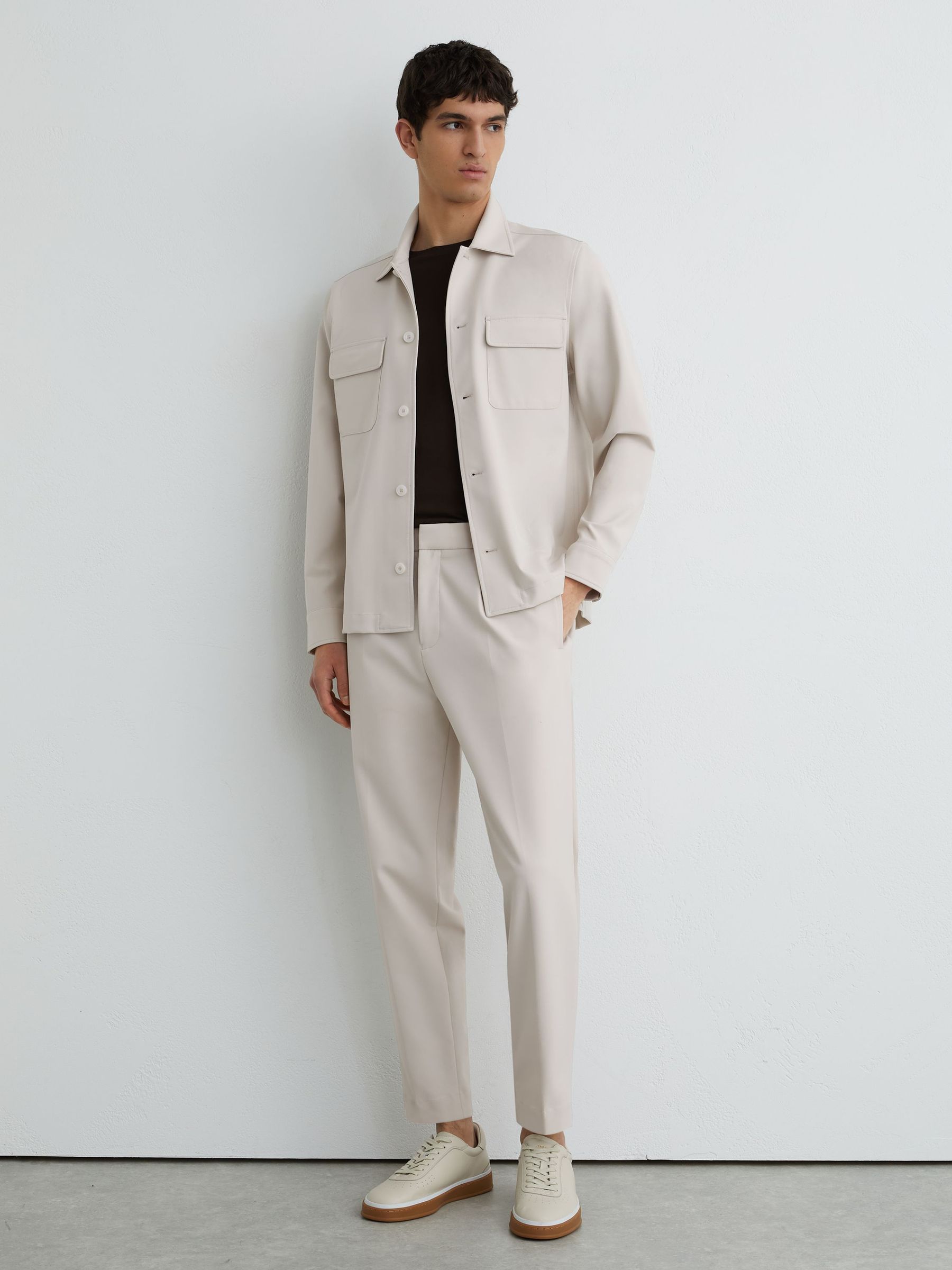 Technical Elasticated-Waist Tapered Trousers in Stone - image 2