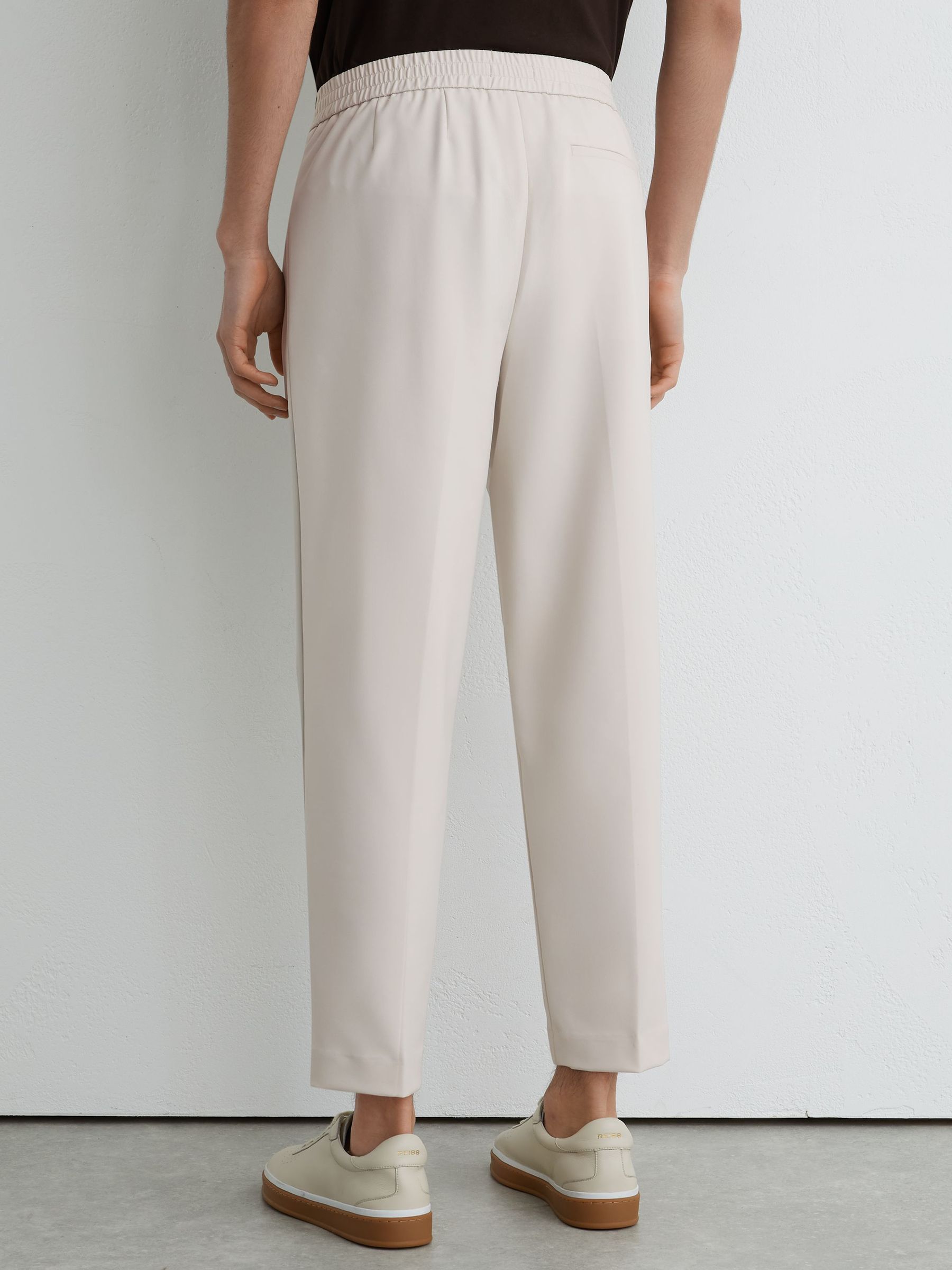 Technical Elasticated-Waist Tapered Trousers in Stone - image 5