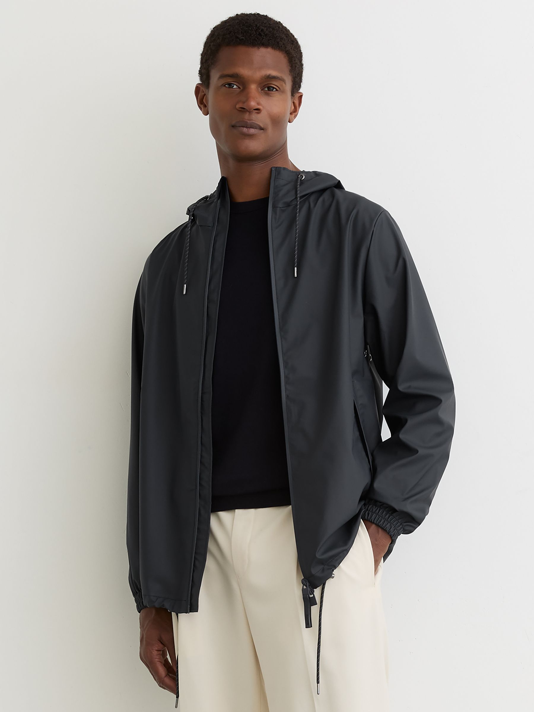 Rains Waterproof Hooded Raincoat in Navy - Image 1 of 5